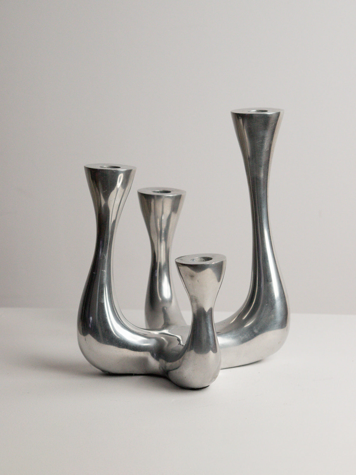 Organic Modern Four-Arm Candelabra in Polished Cast Aluminium, Swan Neck Arms, Northern European 1980s — side angle