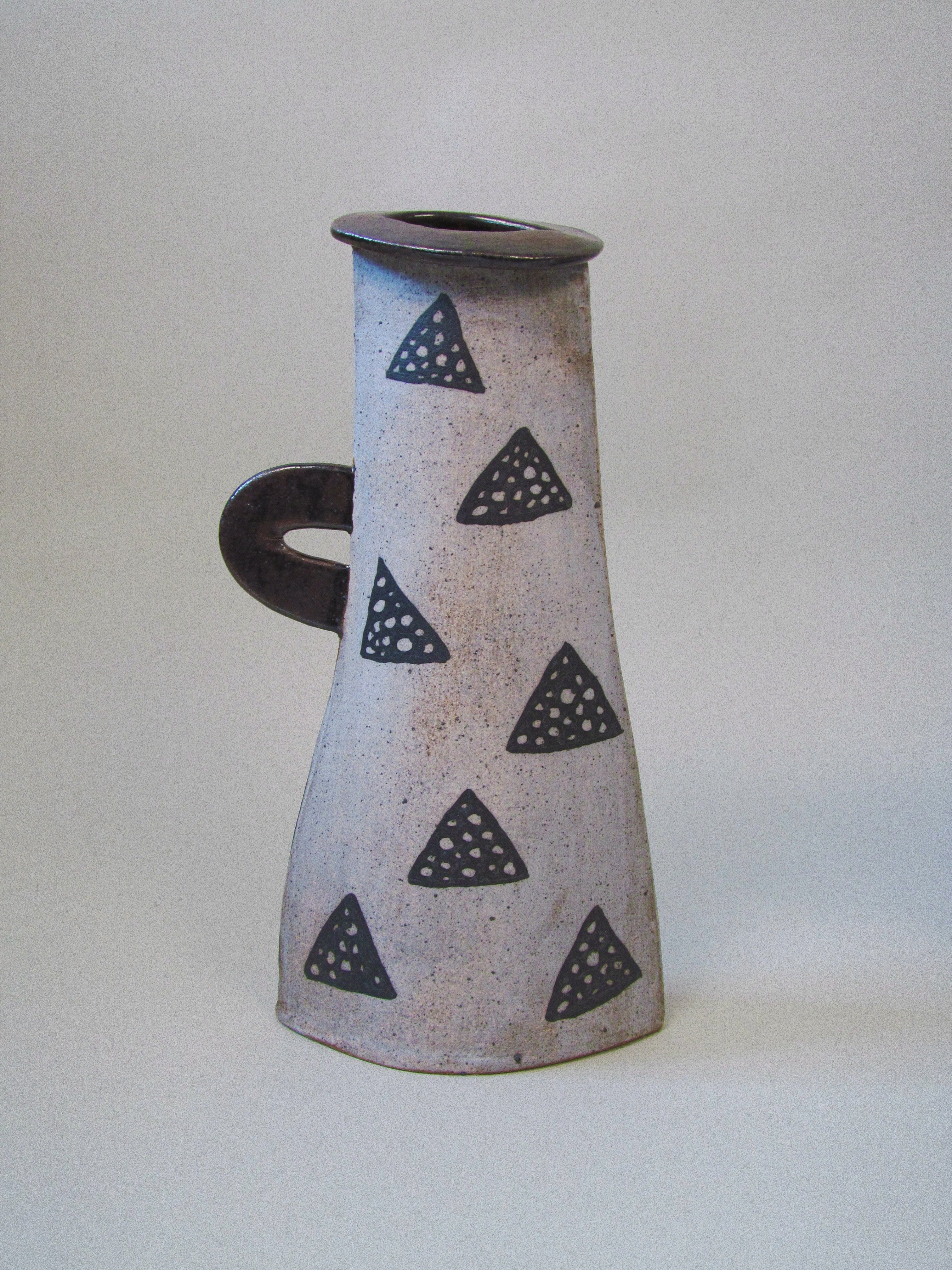 Kazuko Matthews Vases — side view of ceramic vase with triangular patterns