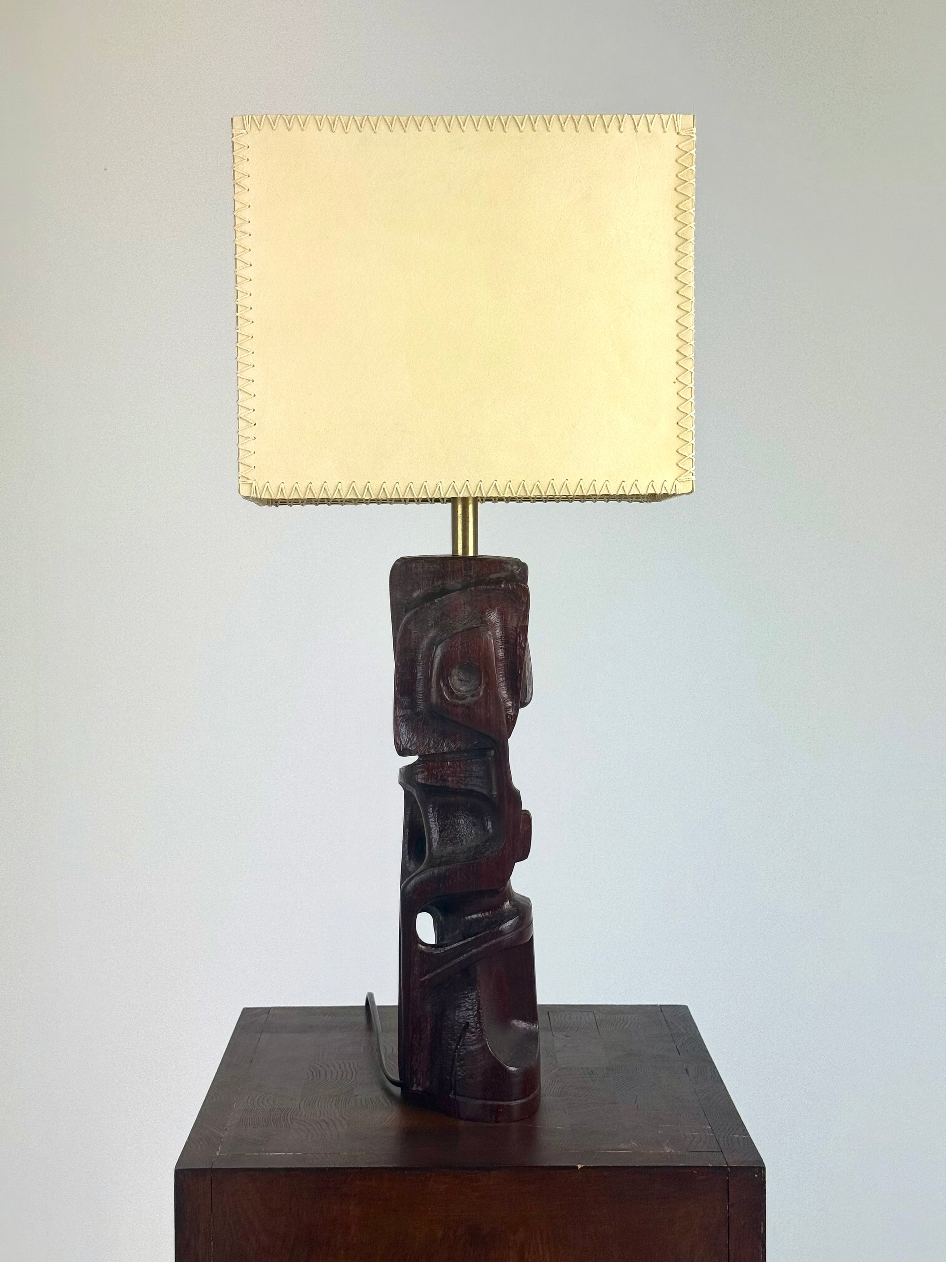 Hand-carved wooden sculptural table lamp by Gianni Pinna — in context