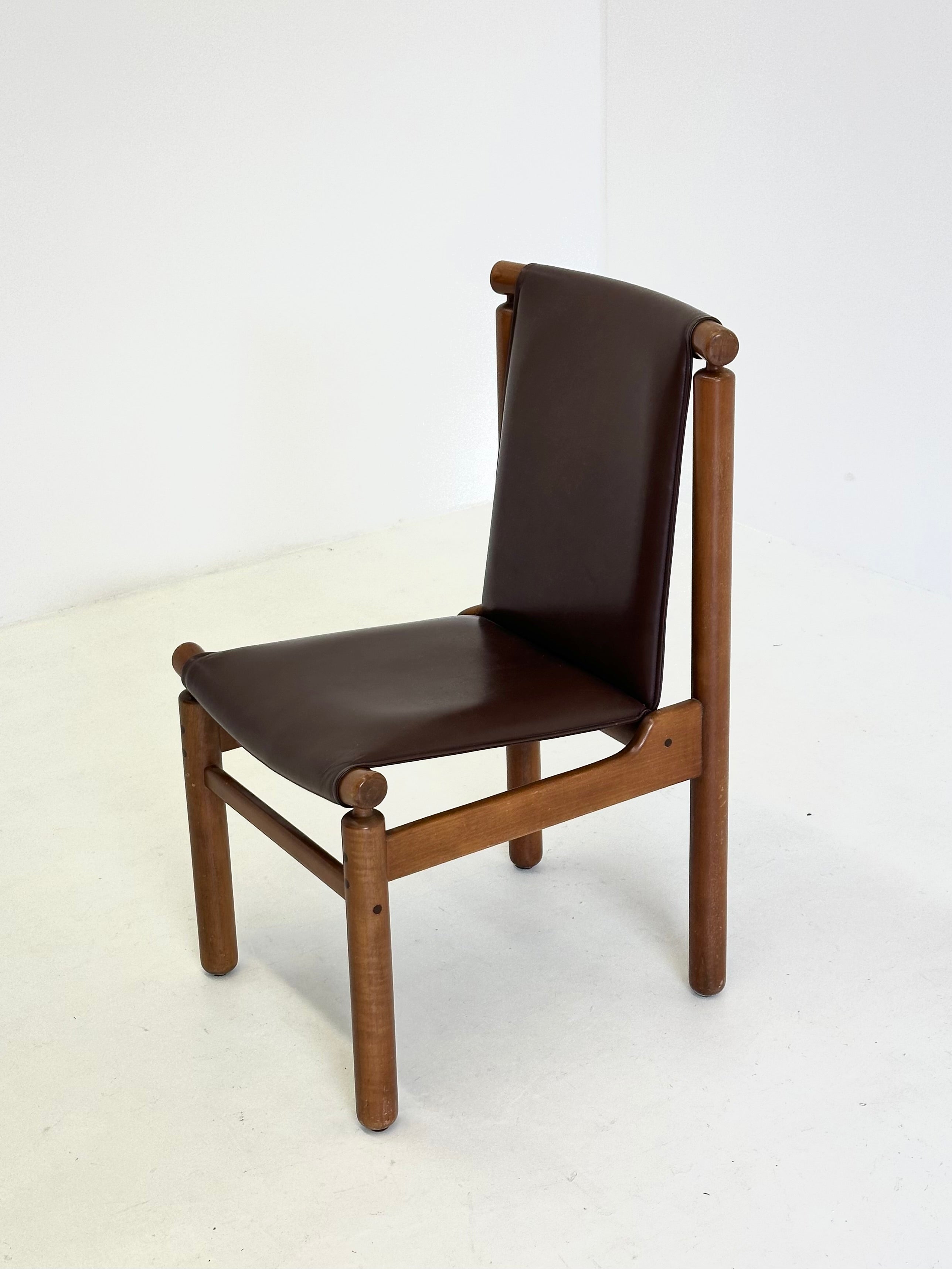 Set of Tapiovaara dining chairs by La Permanente Cantù — in context