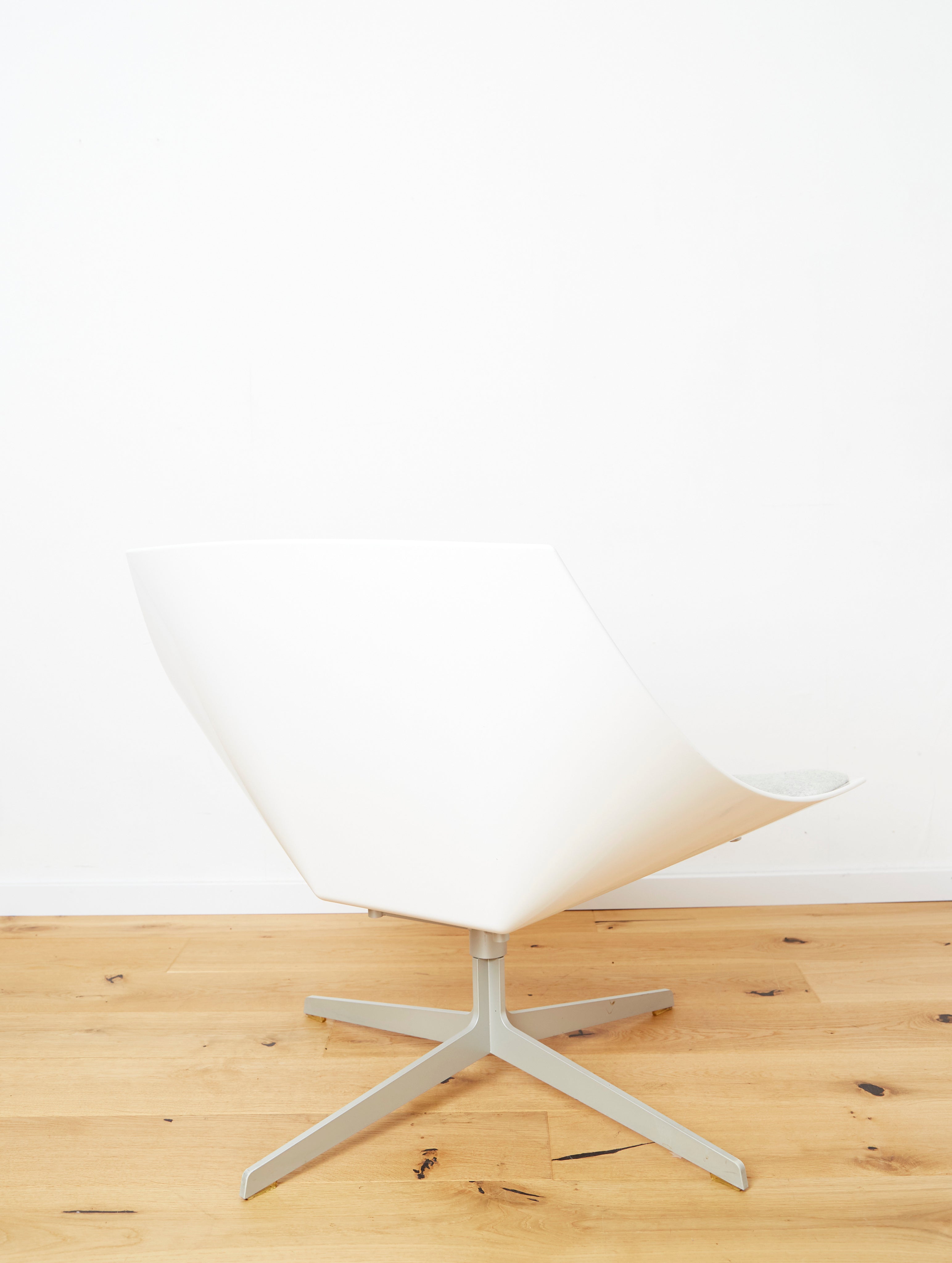Jehs+Laub JL11 Space Lounge Chair for Fritz Hansen — angled view on wooden floor