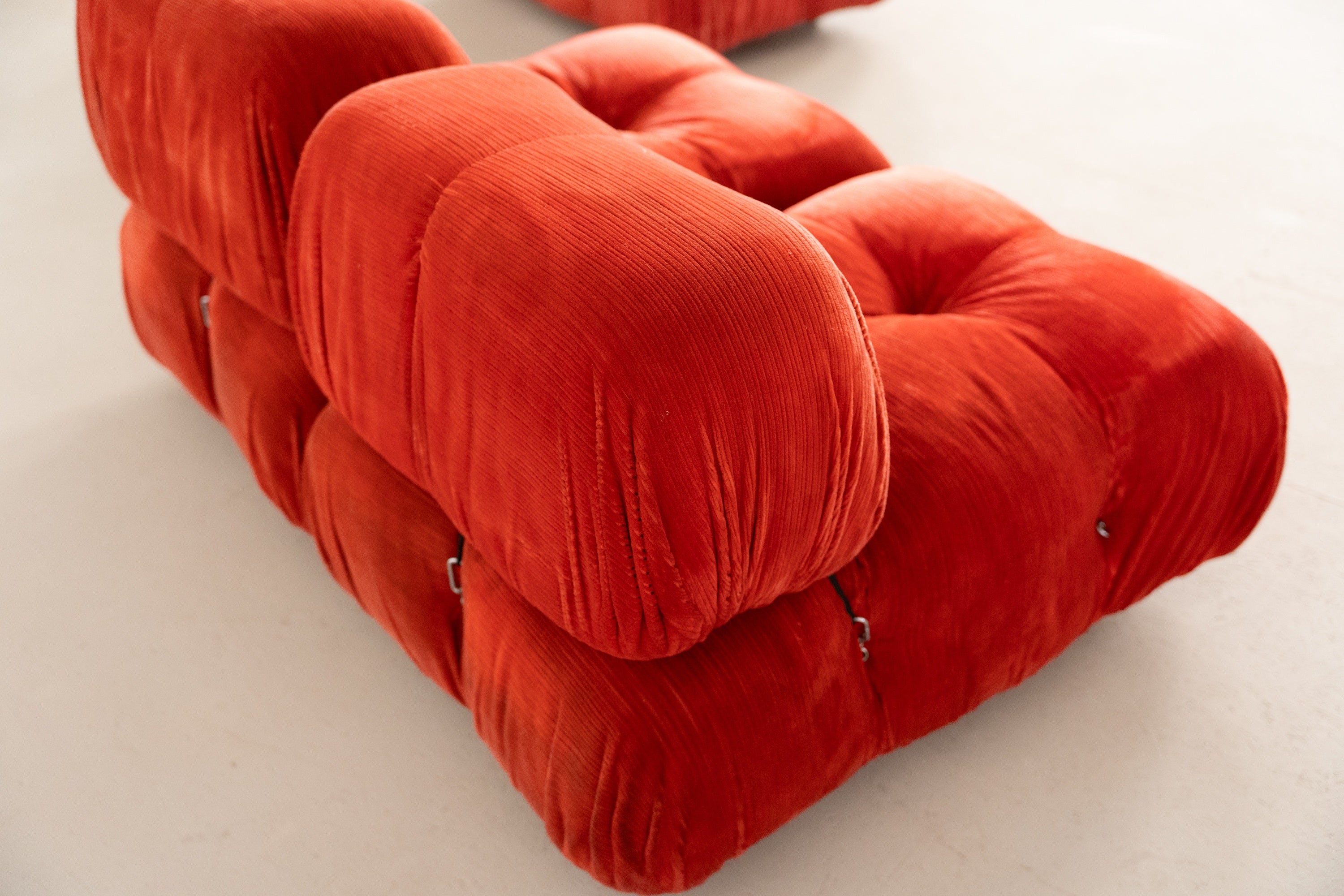 Camaleonda Modular Sofa by Mario Bellini for B&B Italia — angled view of orange corduroy upholstery