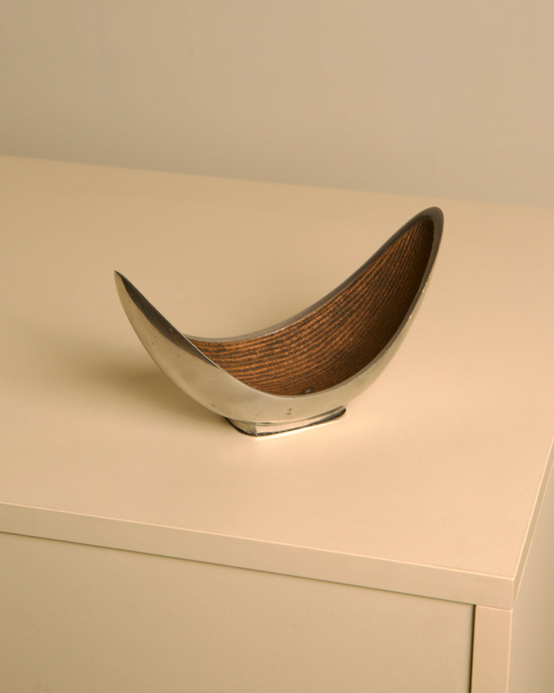 Italian "Croissant" Trinket Tray in cast al — close-up of polished metal with textured interior