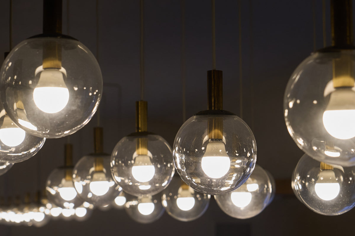 Monumental Mid-Century Chandelier in Glass, Metal and Patinated Brass 1960 — lifestyle setting