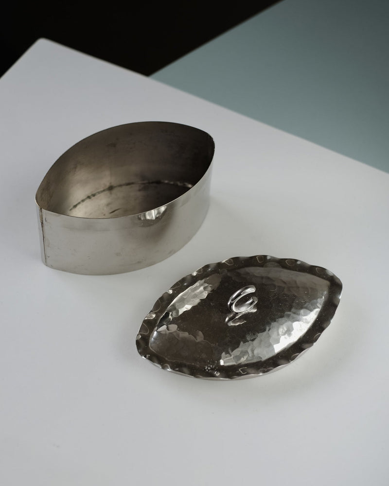 Small Hammered Box — close-up of brushed metal surface