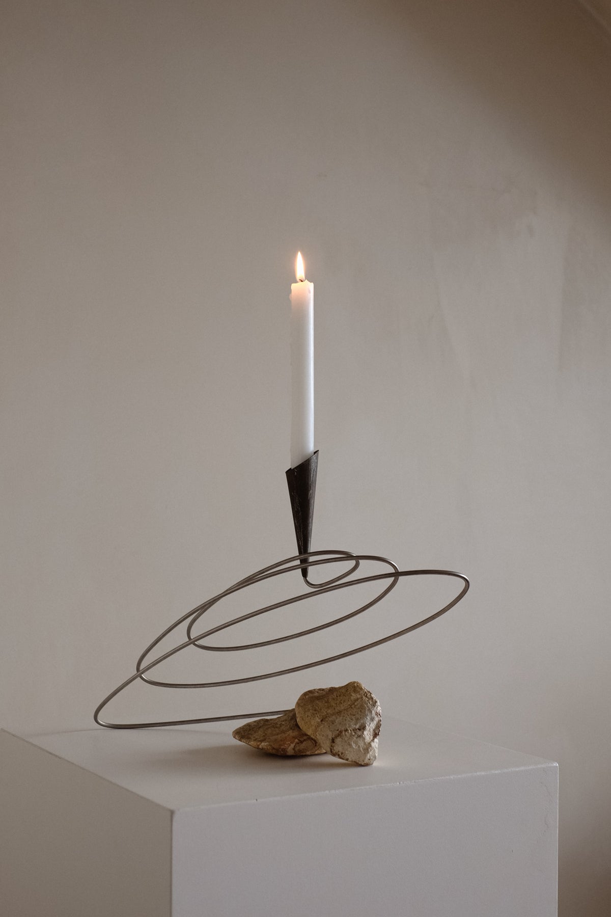 Sculptural Spiral Candle Holder with Stone Base — lifestyle setting
