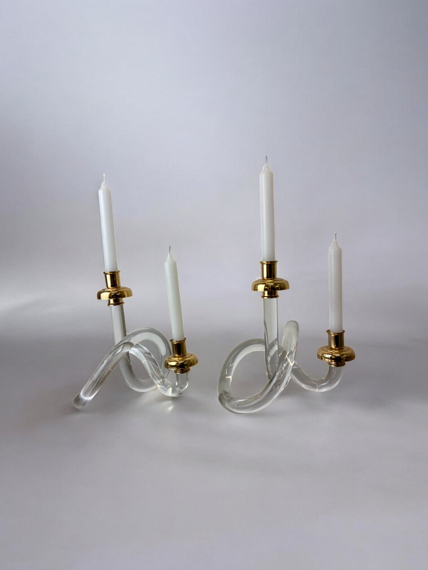 Pair of Pretzel Candleholders by Dorothy Thorpe, Circa 1970 — close-up of clear glass and brass details