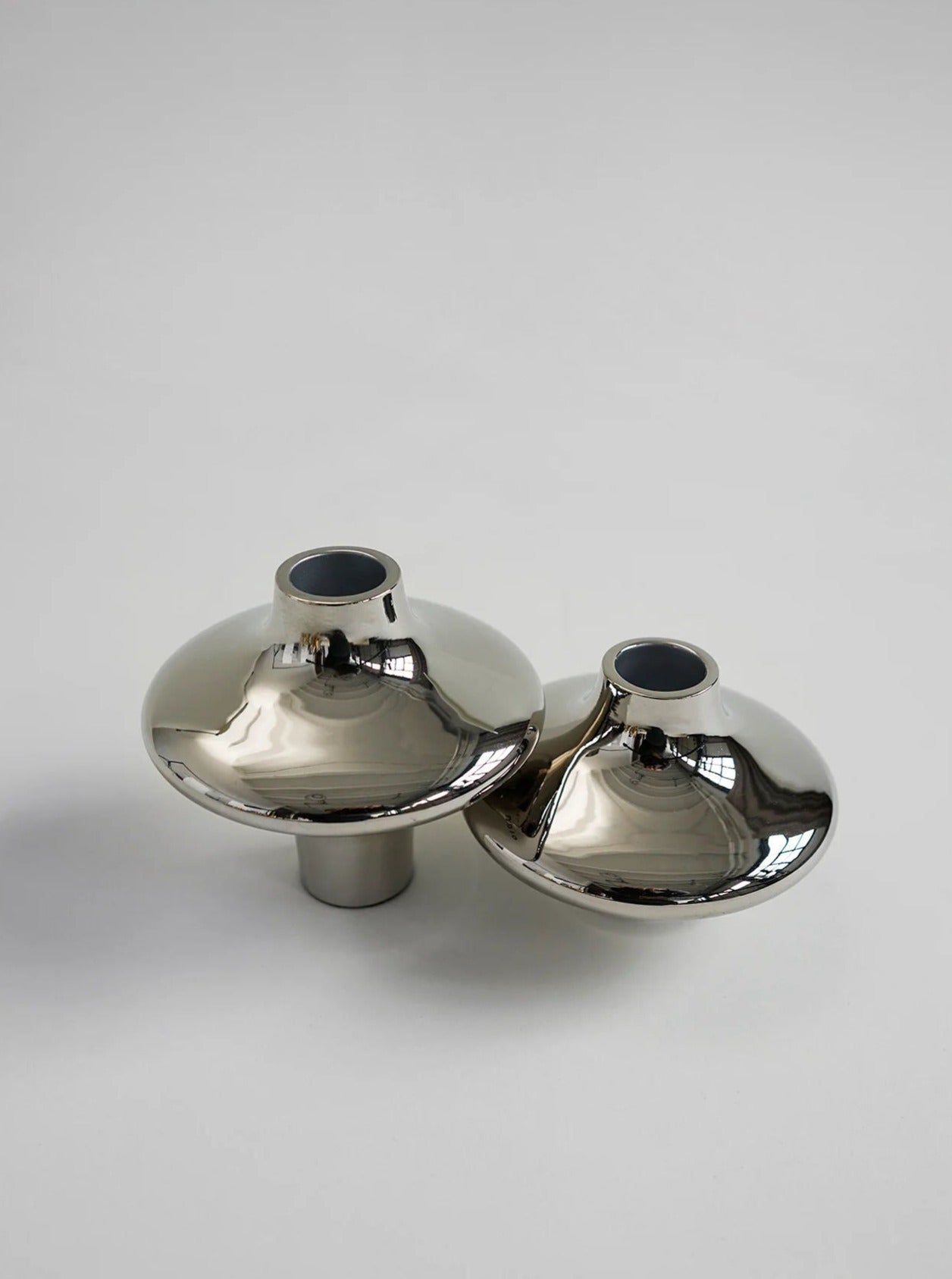 Doublet Candleholder - Small - Silver — top view of shiny silver surface