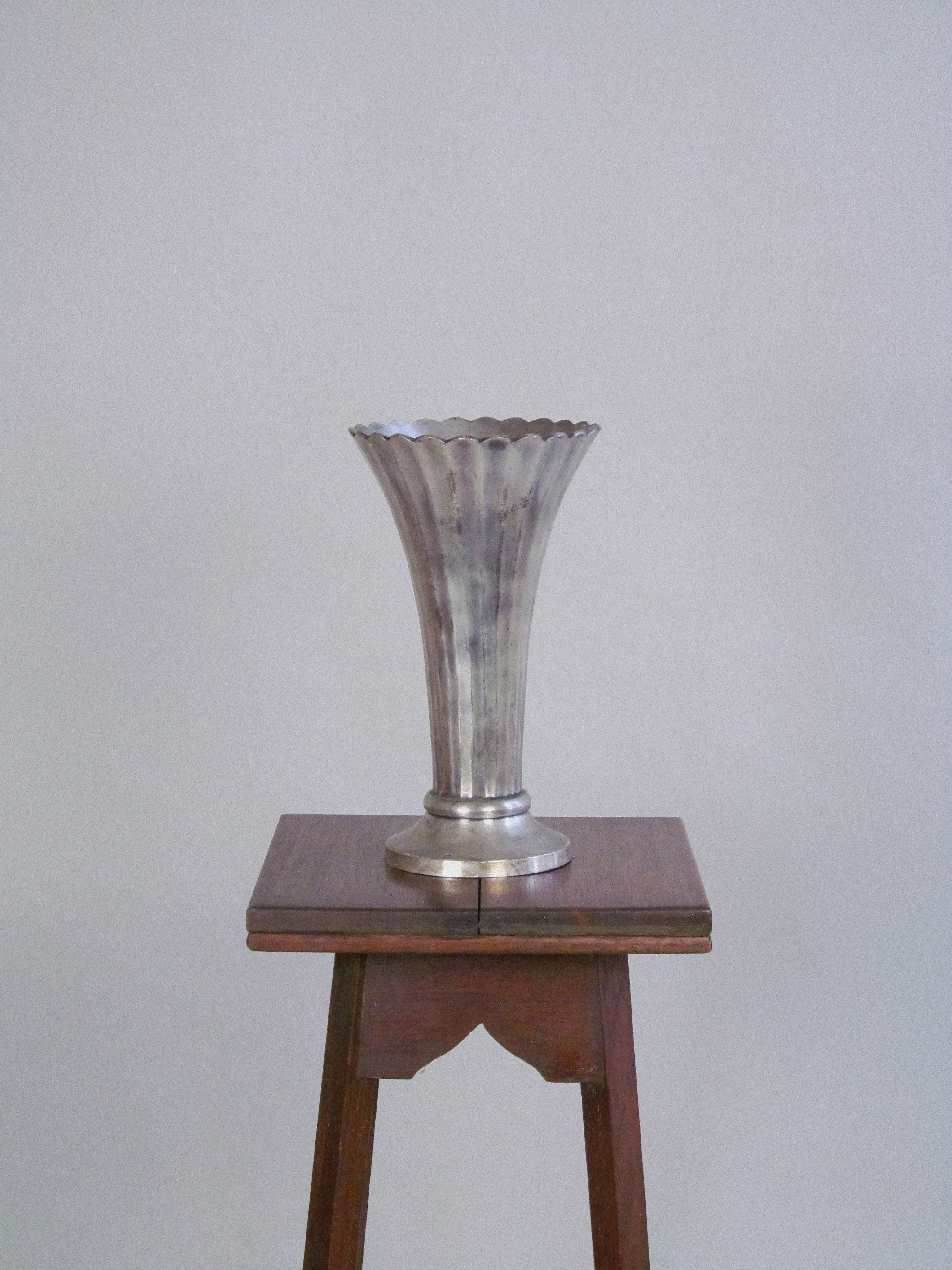 Scalloped Secessionist Vase c1920 — silver vase on wooden pedestal