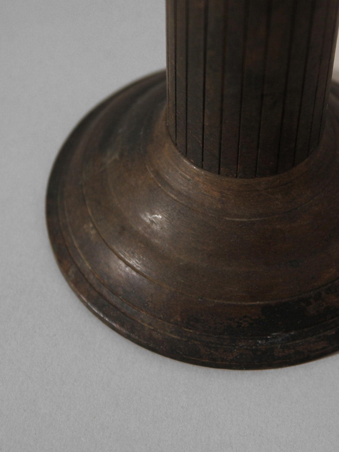 Massive Iron Vintage Candlestick — side angle showing textured base detail