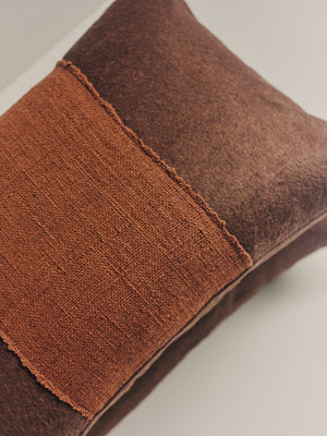 Handwoven brown cushion in wool & cotton — side angle