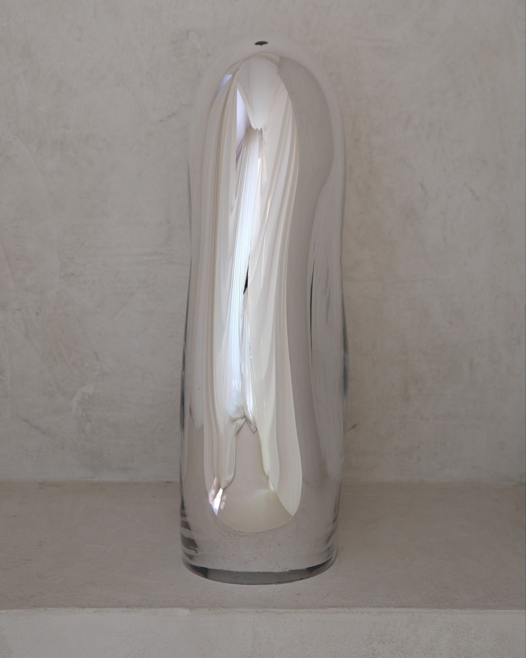 Standing Mirror Glass Sculpture No. 21 | color silver — side angle showing reflective surface on neutral backdrop