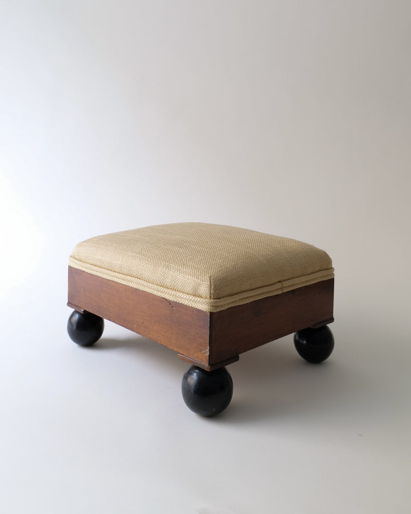 Swedish 1800s ottoman stool with beige upholstery on wooden wheels