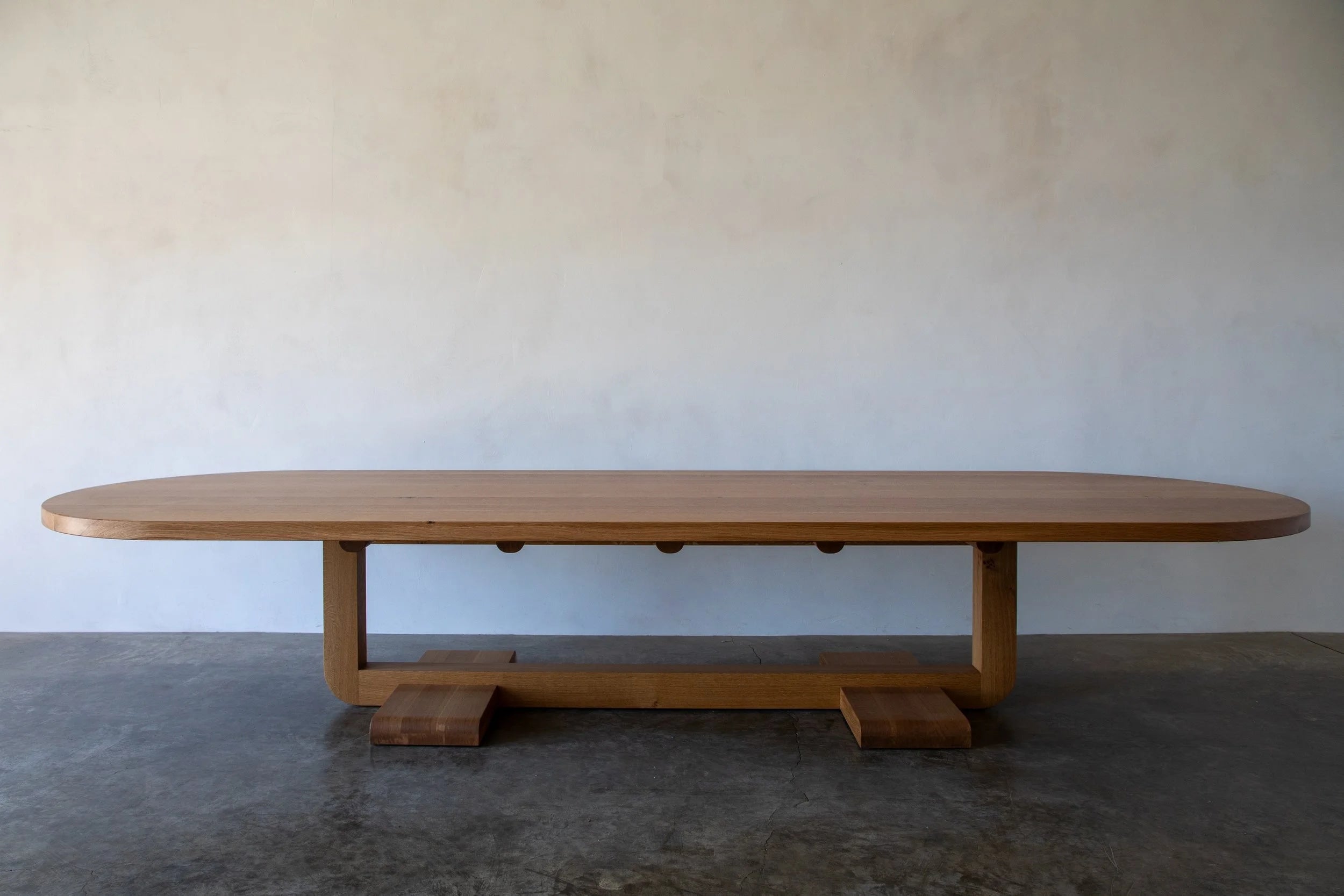 Alpen Long Dining Table — side angle showing natural wood finish