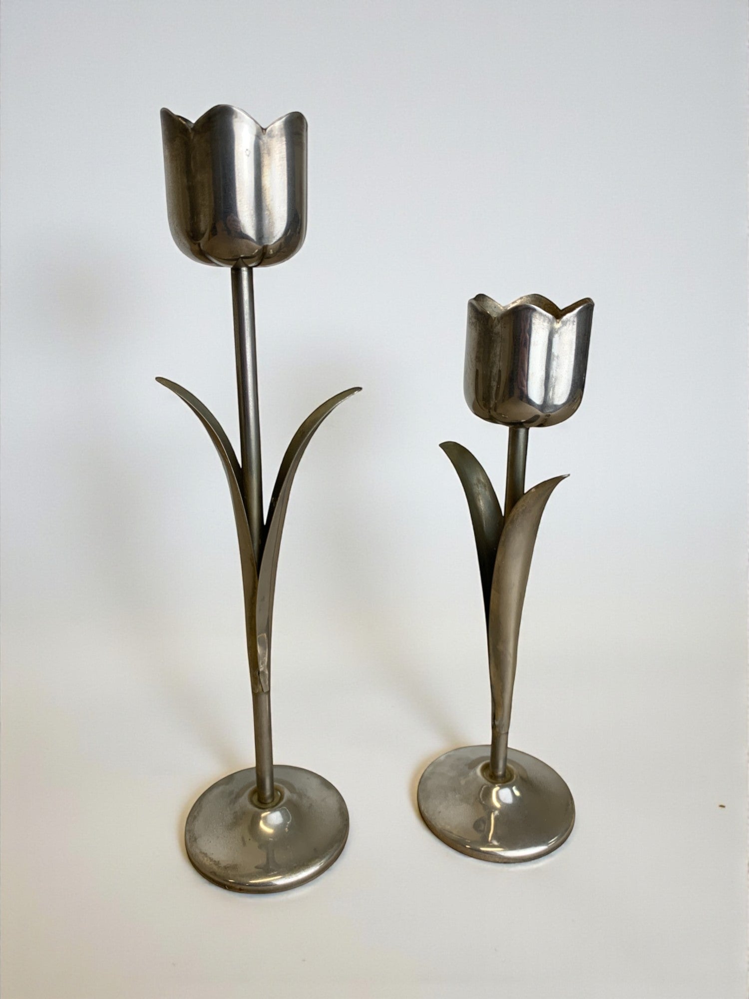 Pair of Chromed Tulip Candleholders, 1970's, Italy — close-up of polished chrome finish