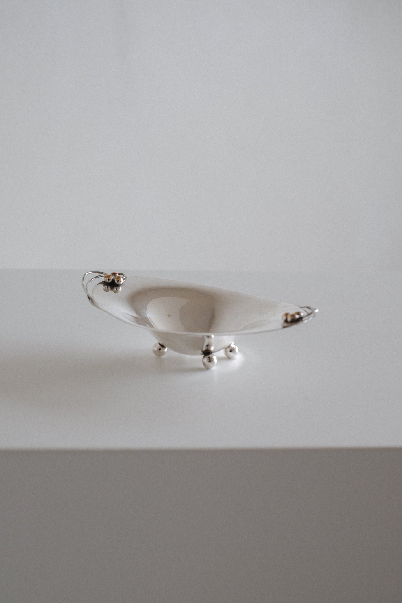 Small Silverplated Bowl — angled view on white surface
