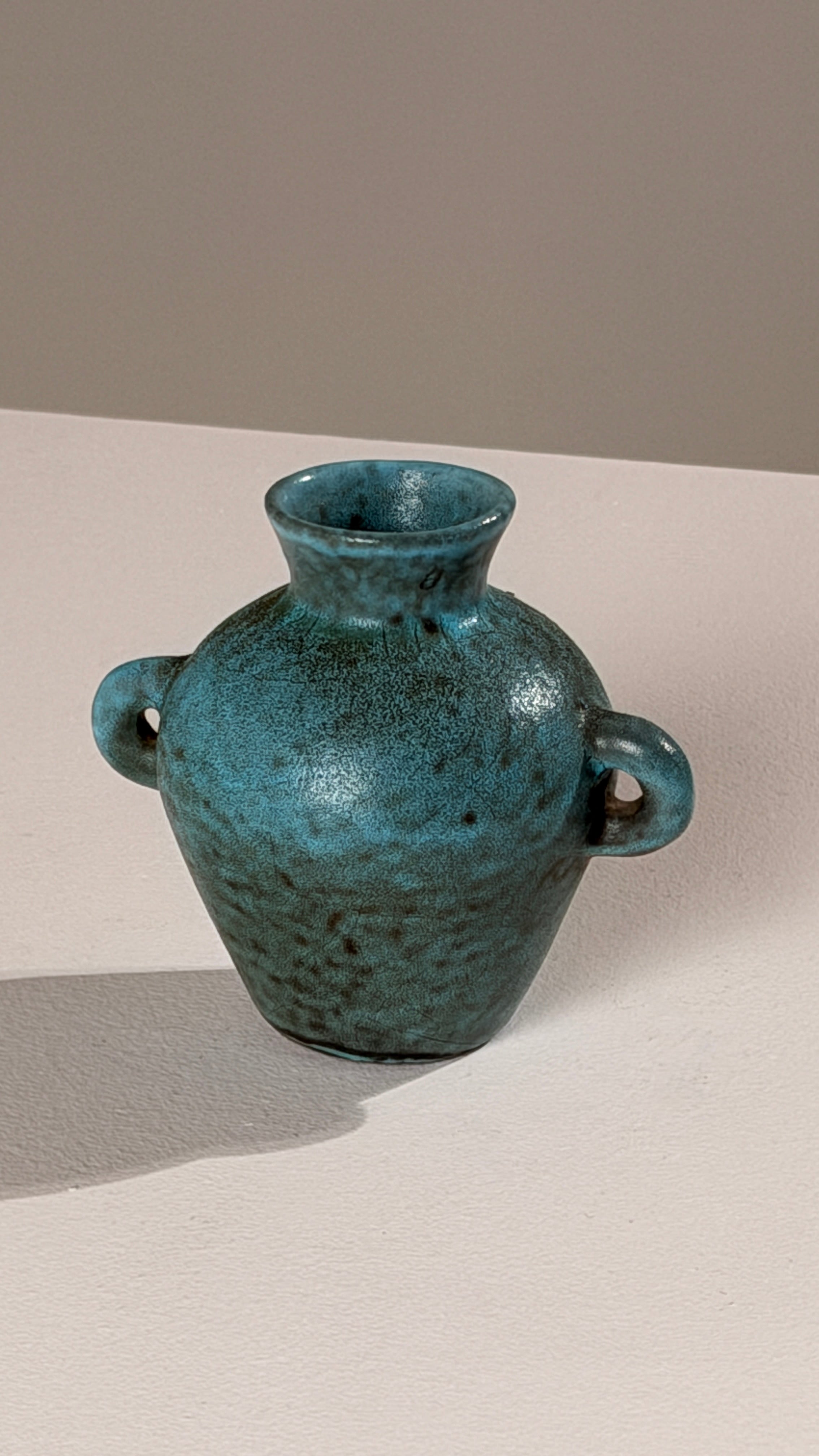 Small Ear-handled Vase by Potiers d'Accolay, France, circa 1960 — close-up of textured turquoise ceramic surface