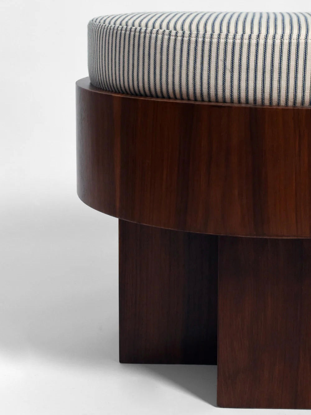 The "Vitruvio" Walnut stool by Barracuda Interiors features a modern round base with four legs and a blue-and-white striped circular cotton cushion, crafted in Portugal.