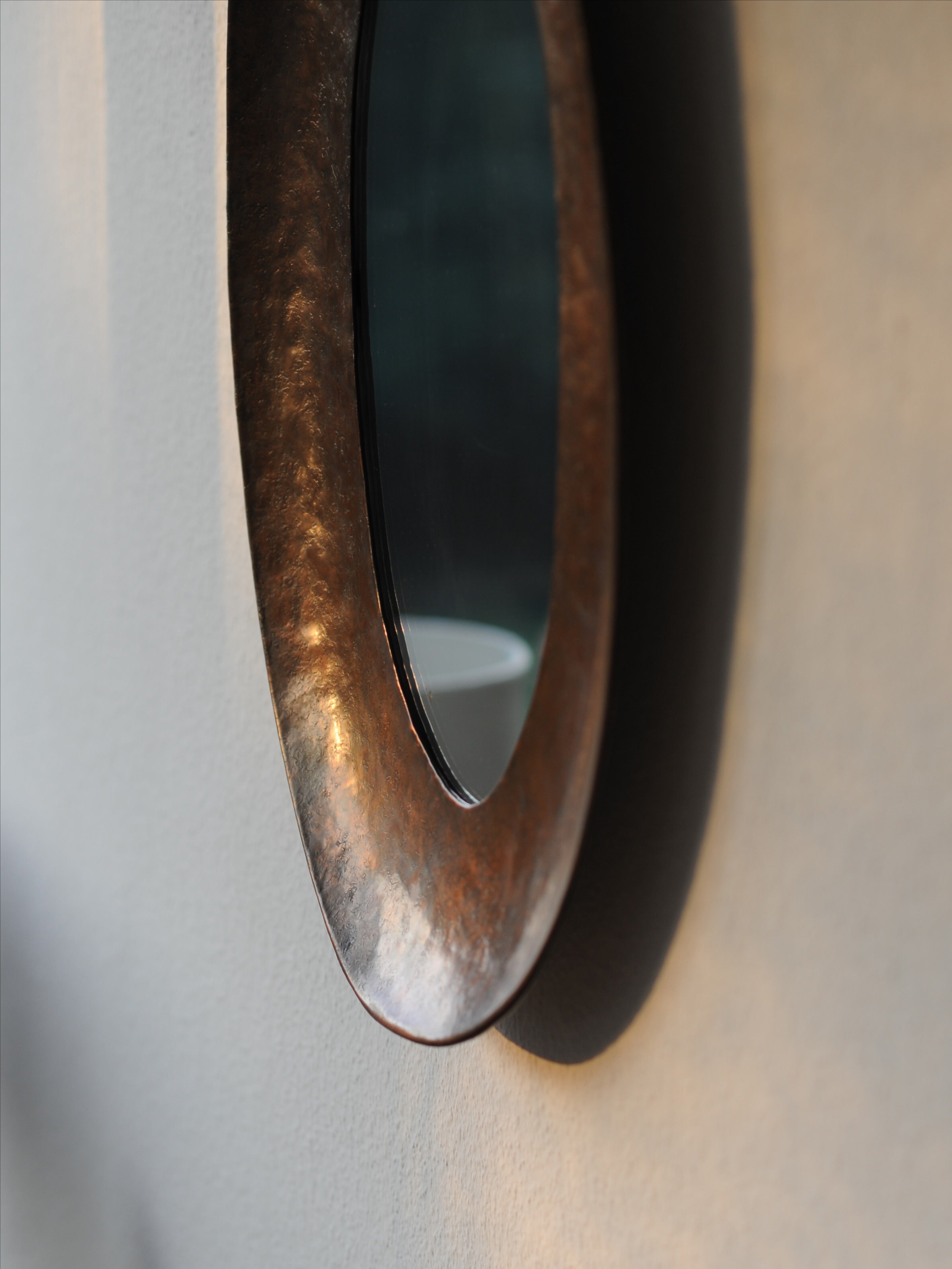 Angelo Bragalini Hammered Wall Mirror In Copper, Italy 1960 — lifestyle setting