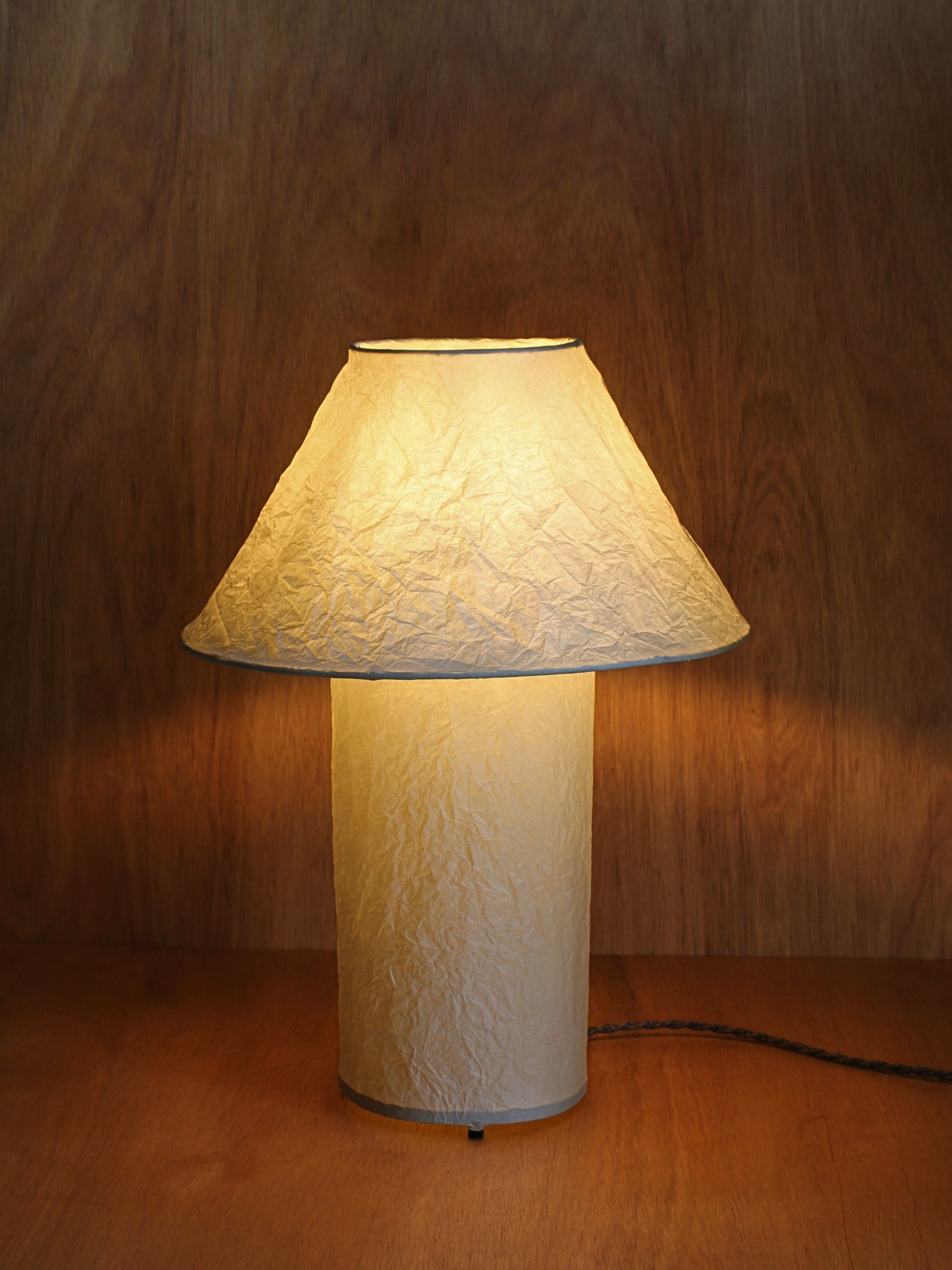 Lugh' Table Lamp - Ivory — side angle showing textured paper shade