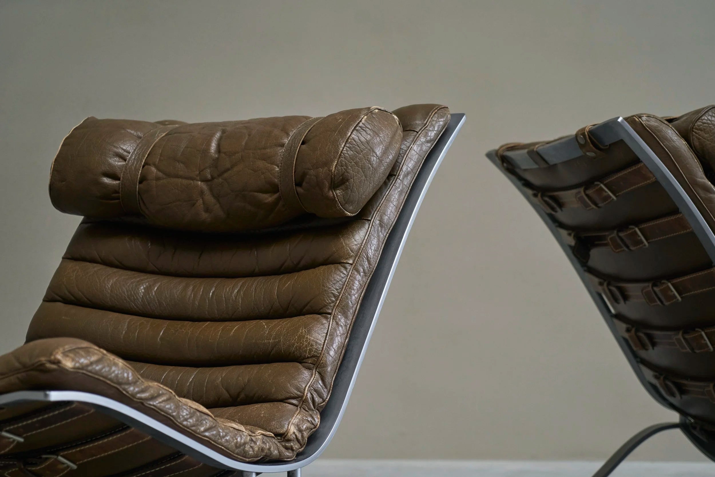 Arne Norell Pair of Ari Lounge Chairs in Steel and Patinated Leather, 1960s — in context