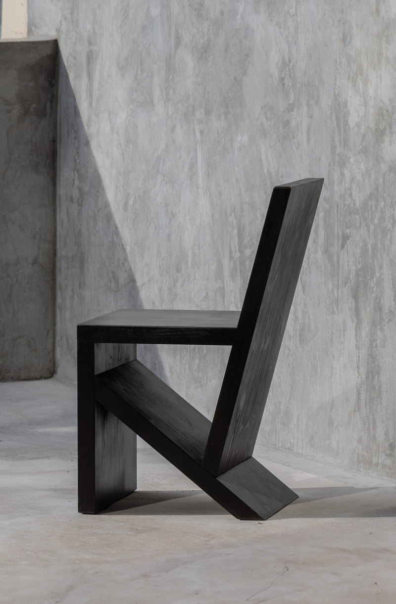 CH01 CHAIR — side profile showing black wooden structure