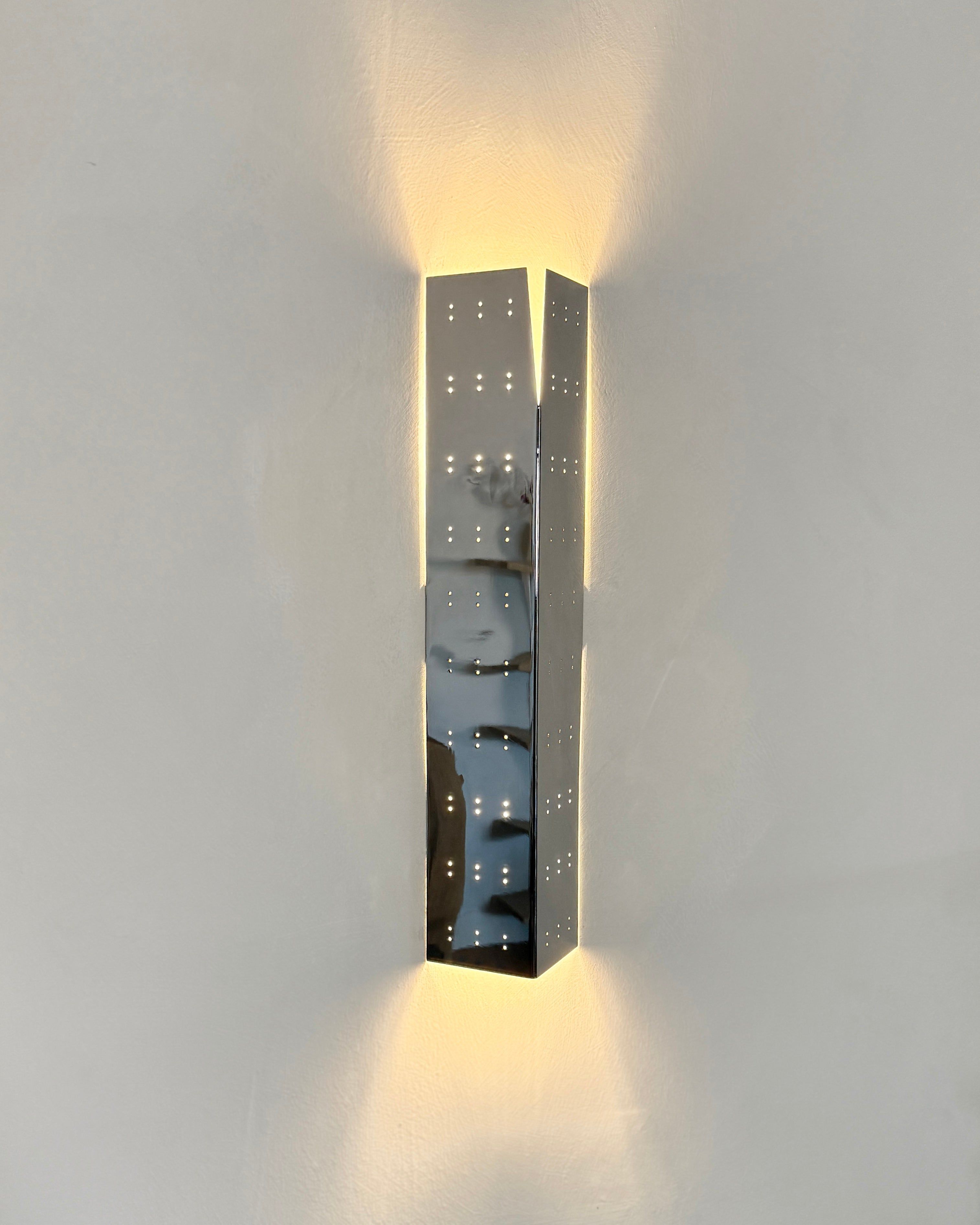 May Wall Lamp - Polished Brass — close-up of polished brass texture