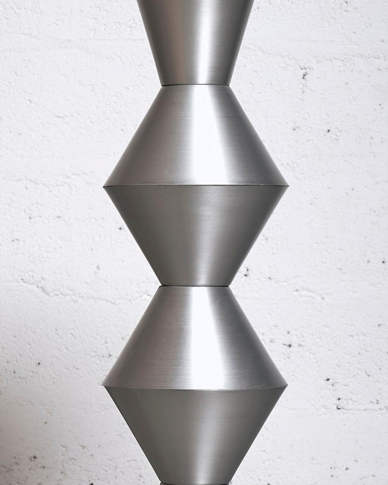 Bar Table by James Irvine for Metals Milano — close-up of brushed aluminum base