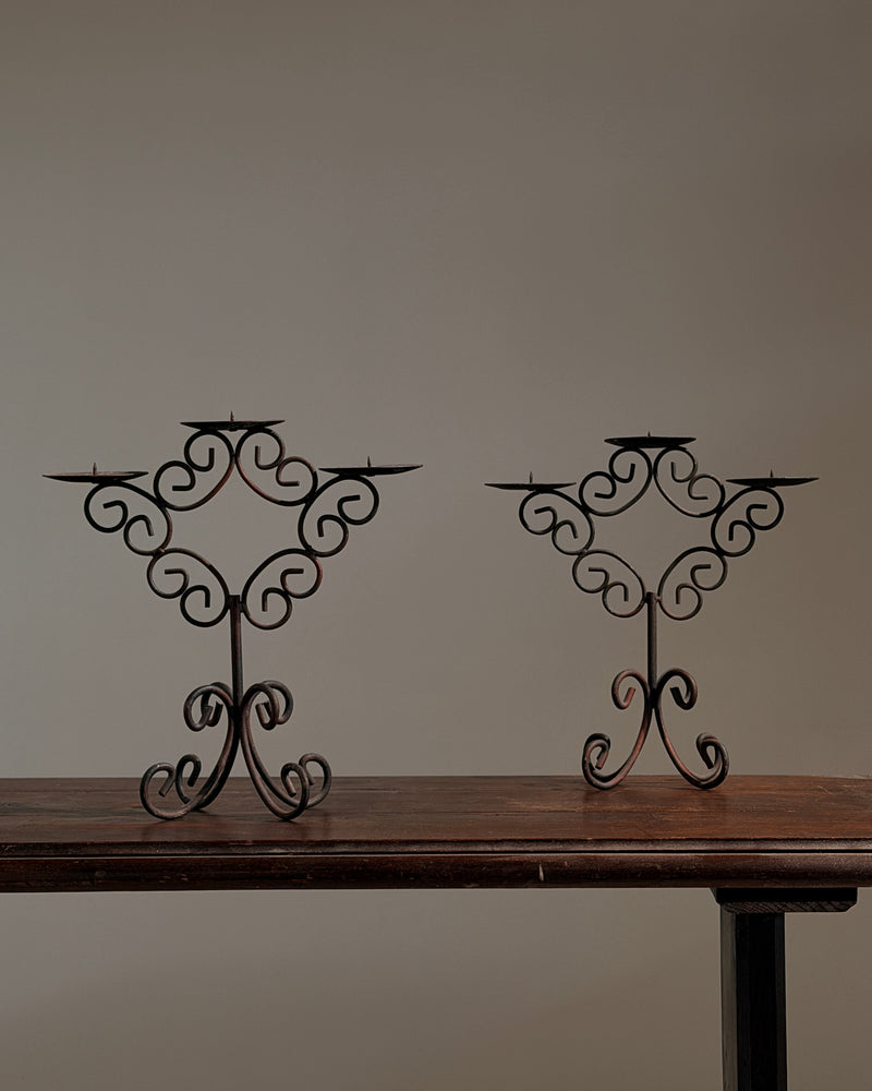 Pair of three-light wrought-iron candleholders, circa 1950 by Figuresdesign | The Oblist