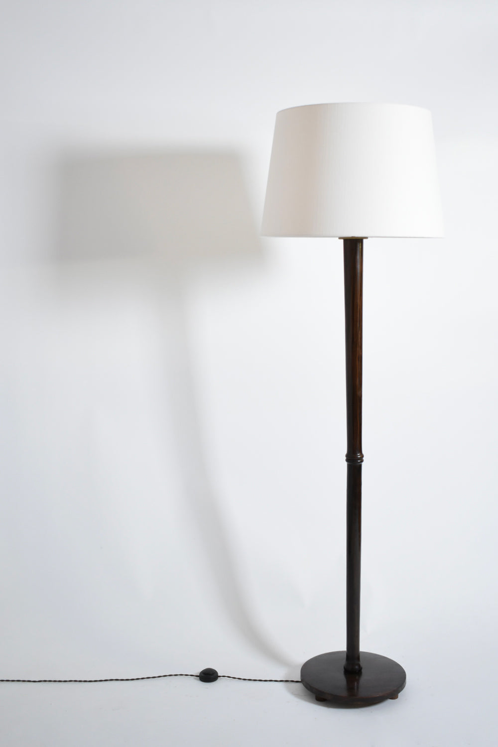Wooden Art Deco Floor Lamp, 1930s — close-up of dark wooden base and white shade