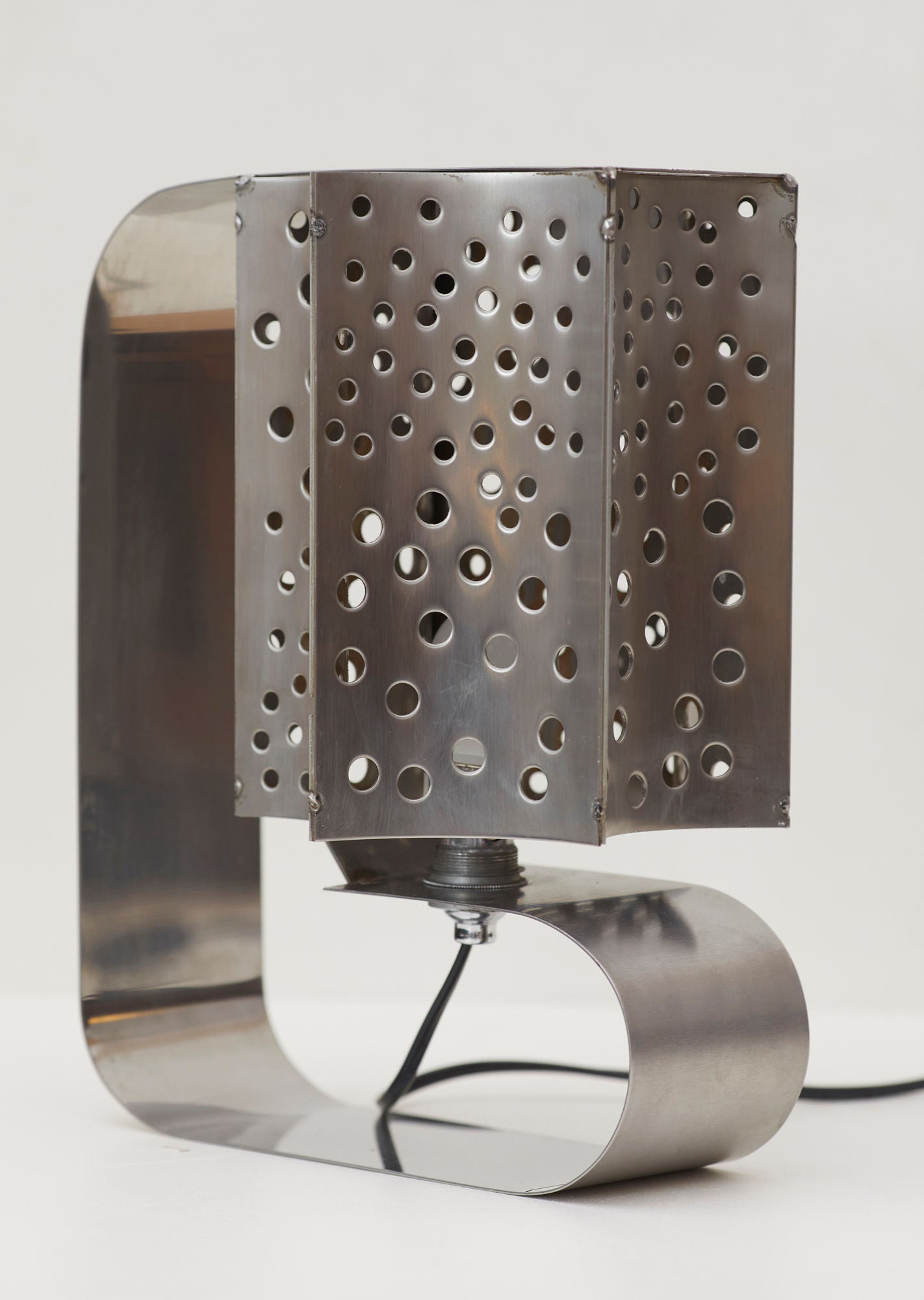 One of a Kind French Artisanal Stainless Steel Table Lamp Vintage Circa 1970 — angled view highlighting perforated metal shad