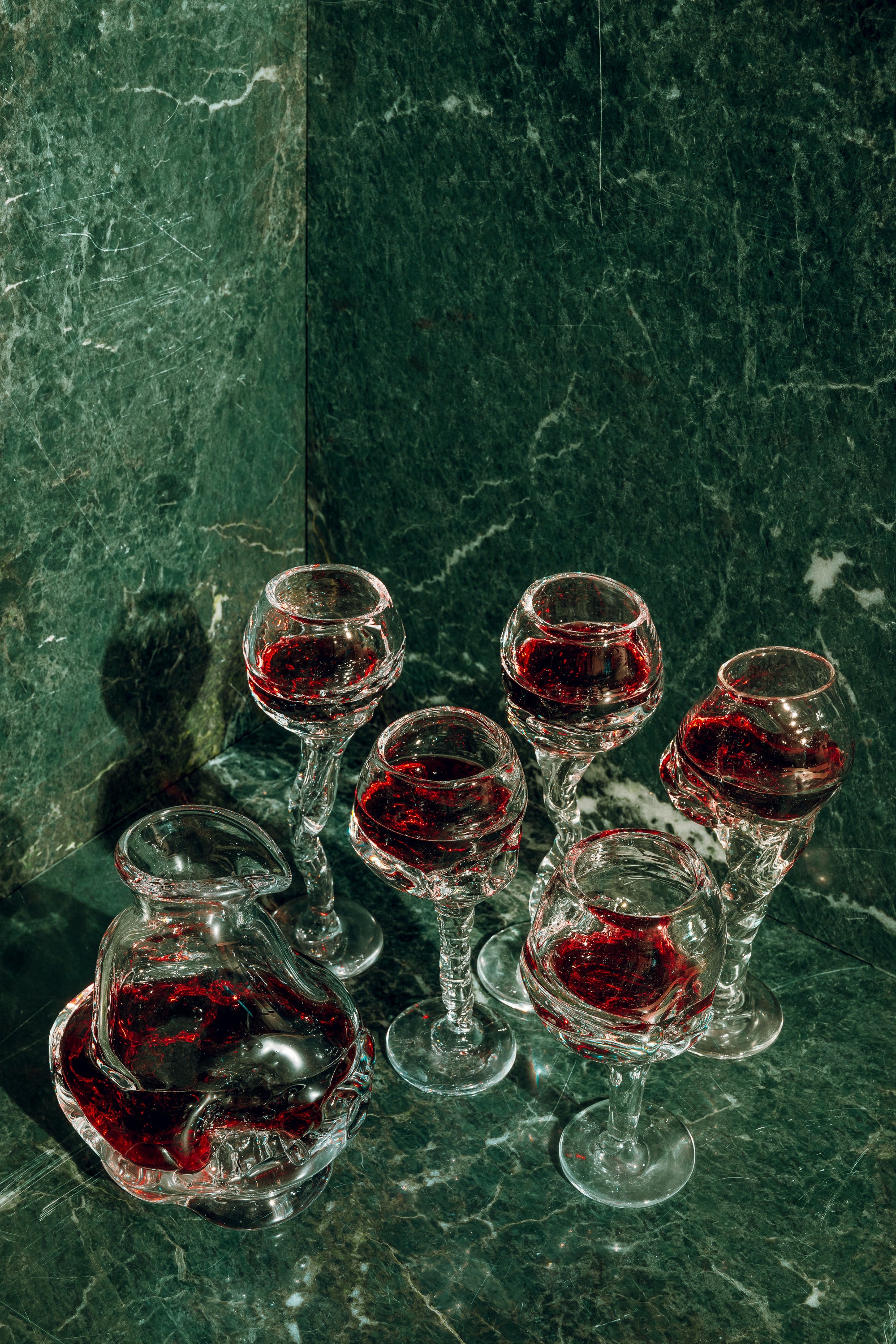 Hand-blown Wine Glass — close-up of glass with red wine on marble
