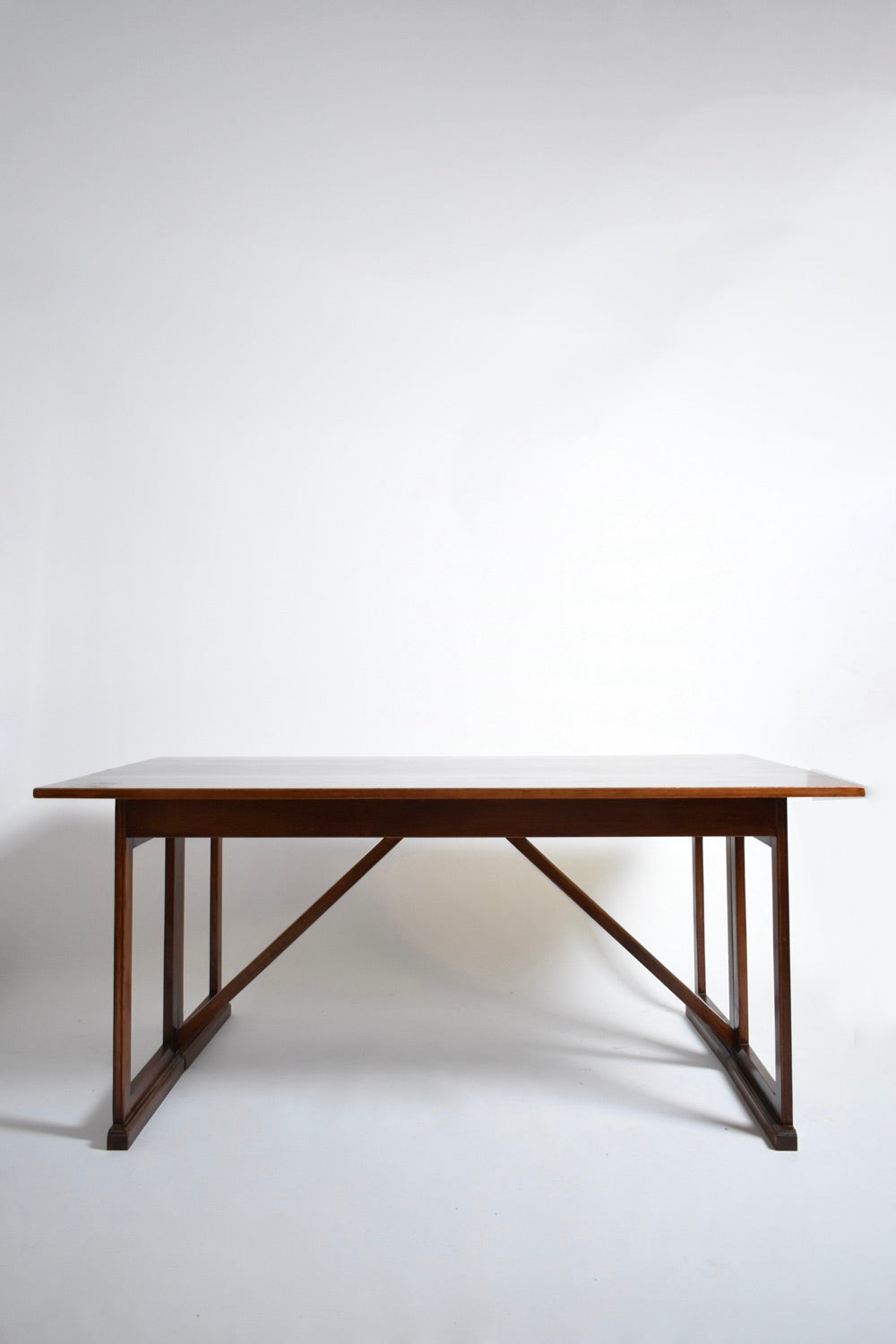 Folding wooden console, 1950s — side view in minimalist setting