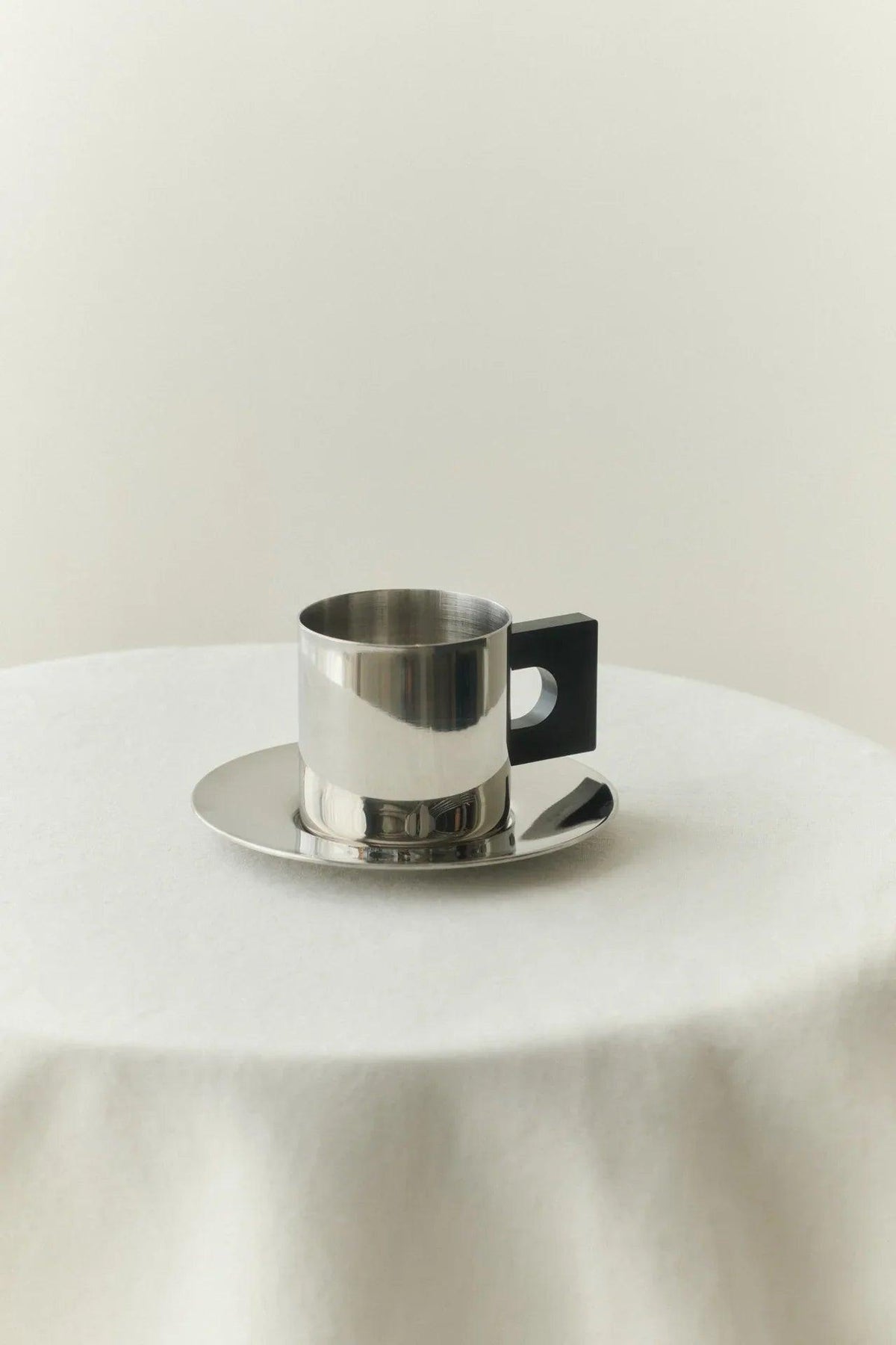 S.R. METAL CUP & SAUCER — close-up