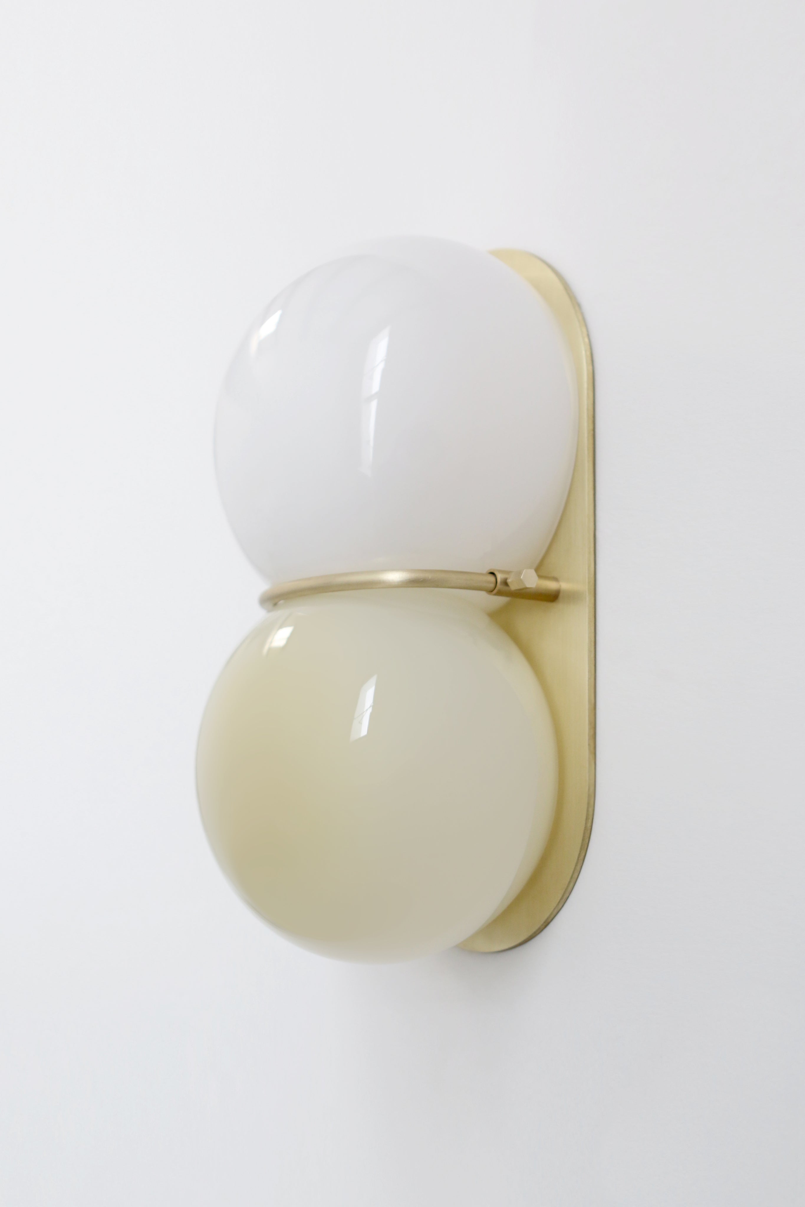 SkLO Twin 1.0 Sconce - Light beige/white glass, Brushed Brass finish by SkLO | The Oblist