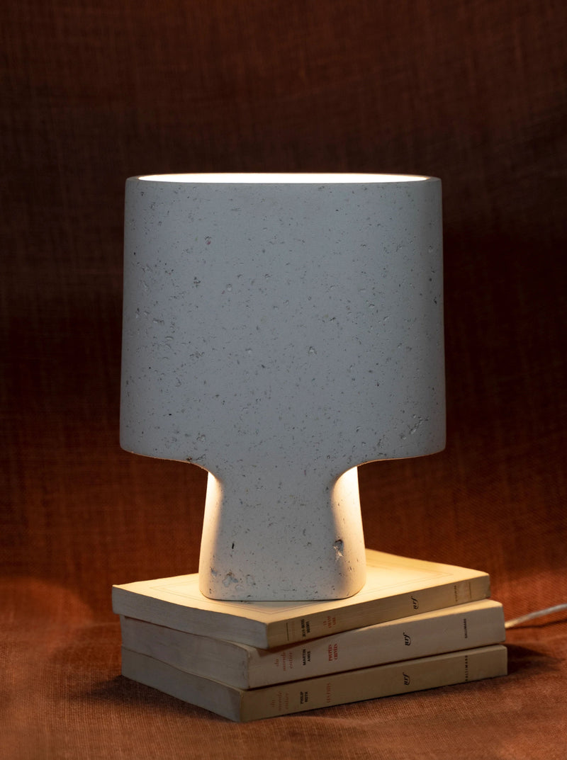 Lamp Bien Faite Naturel White shining brightly in a modern living room setting