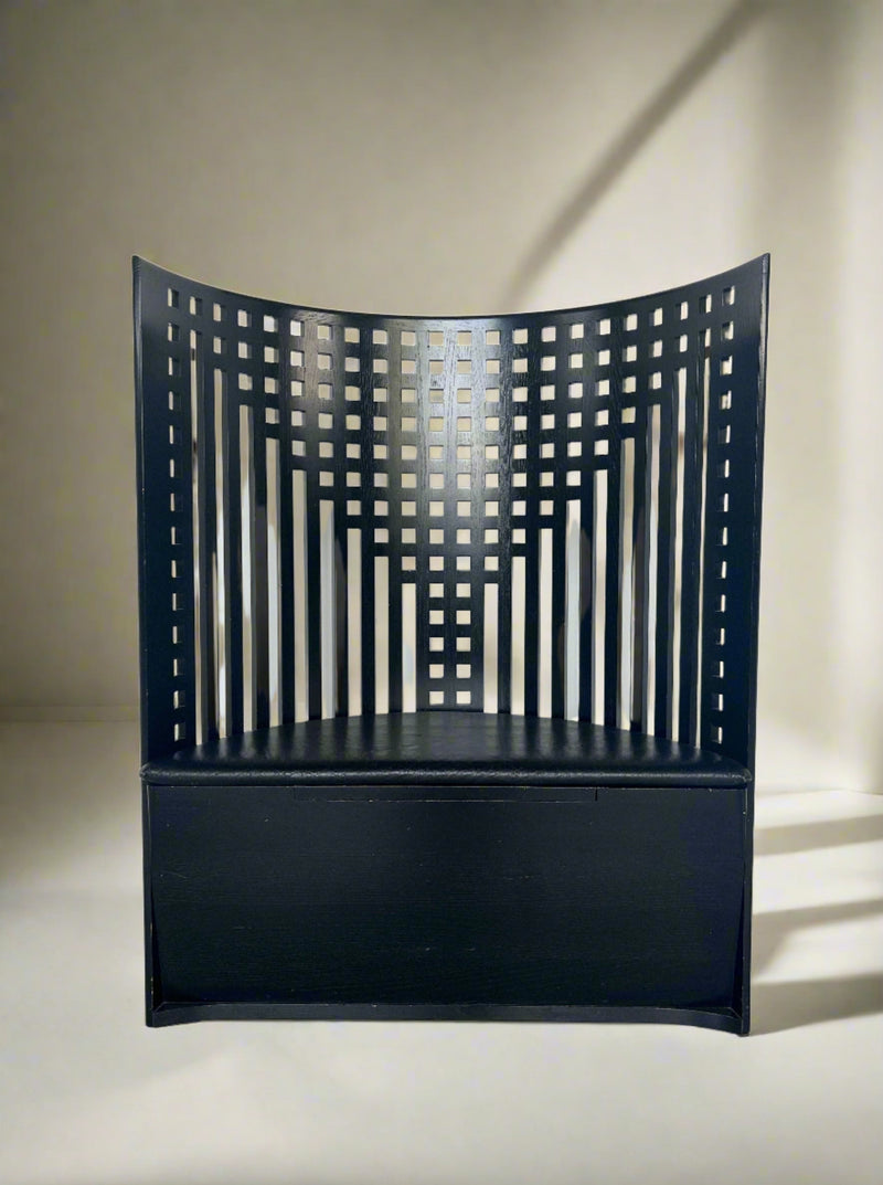 Willow Bench by Charles Rennie Mackintosh, a classic and elegant furniture piece, featuring intricate wooden details and a curved design