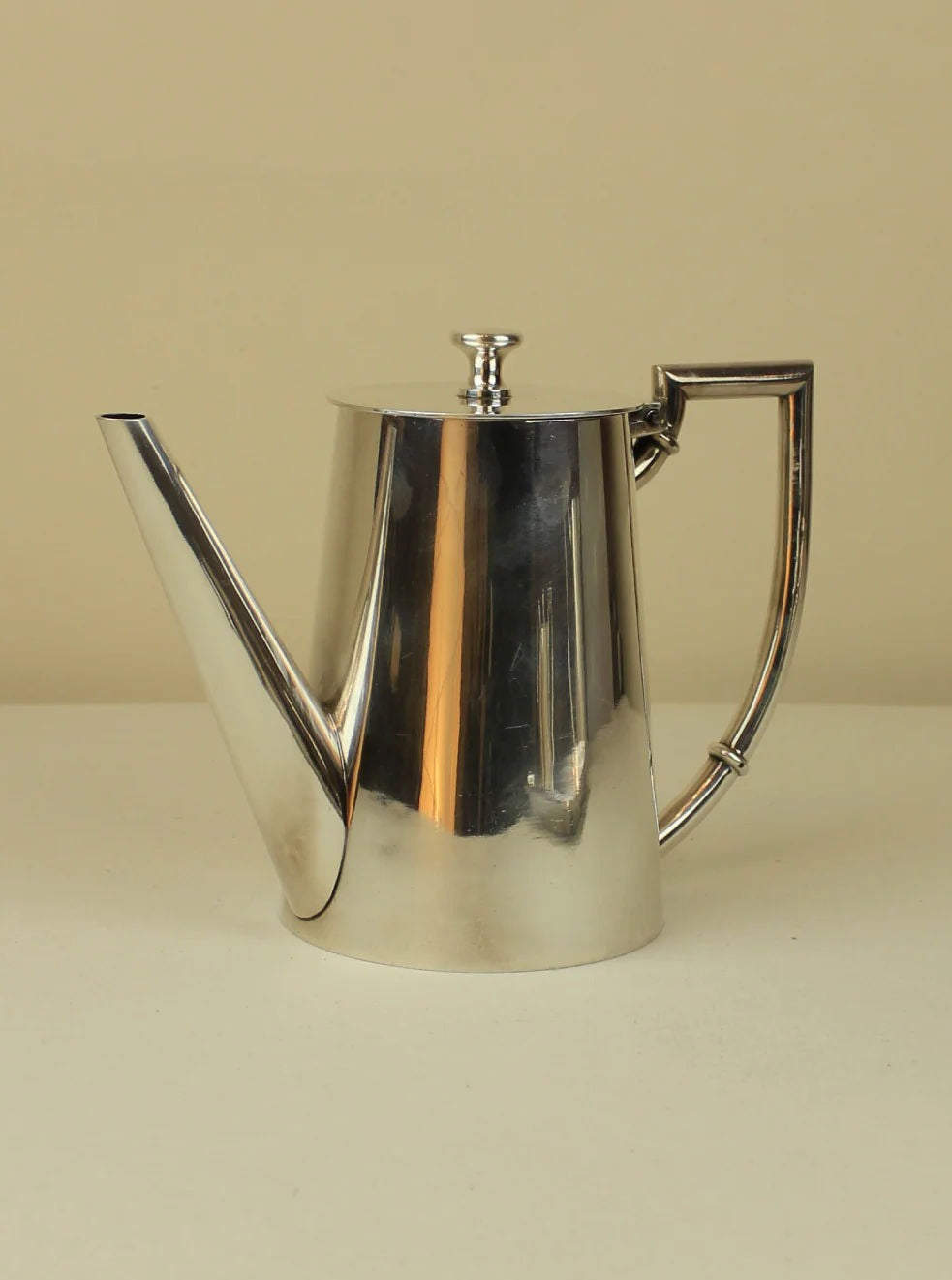 Art Deco Tea/Coffee Service collection with bold, symmetrical shapes and rich colors