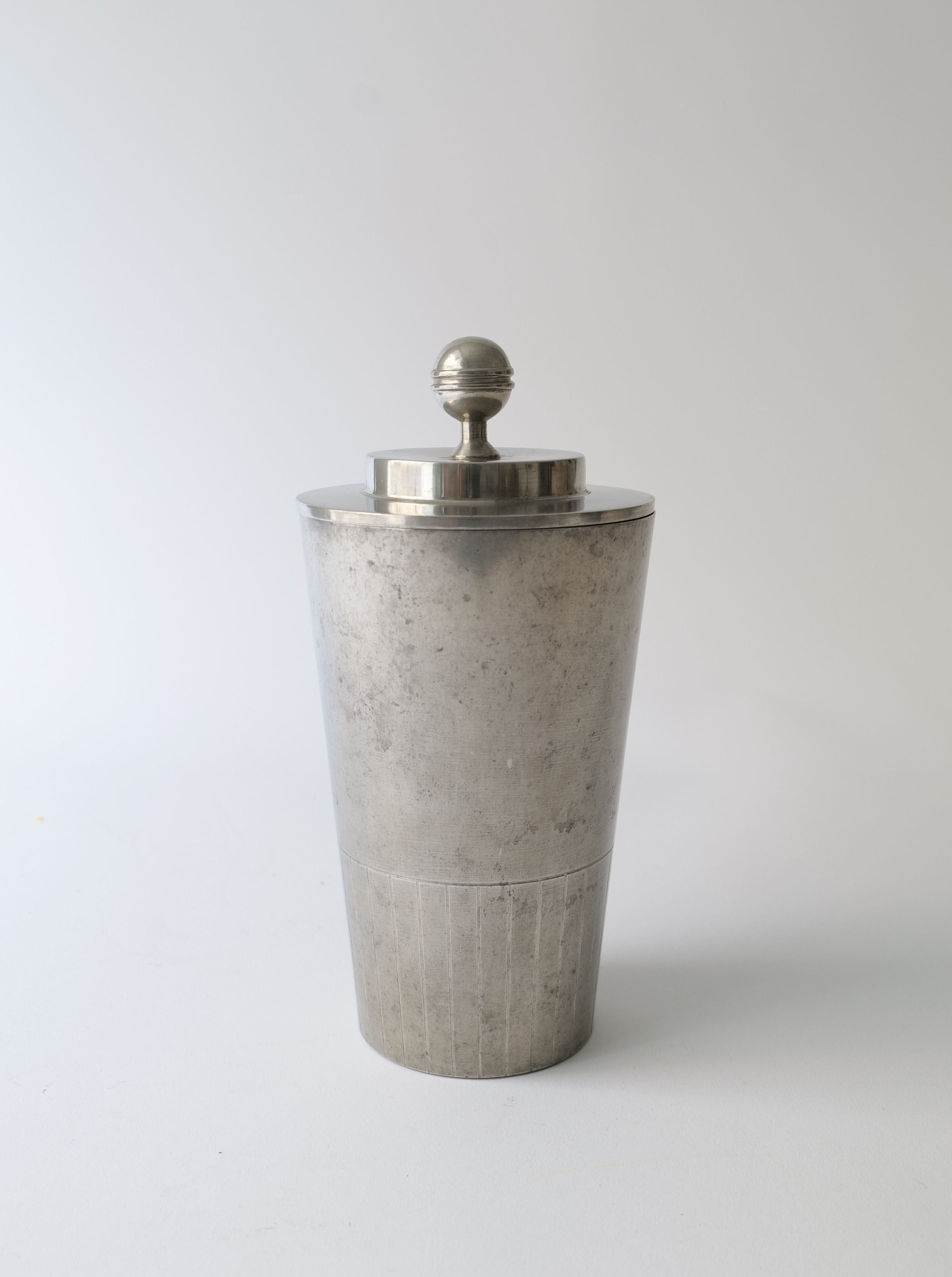 A stunning pewter jar designed by Svenskt Tenn, featuring intricate detailing