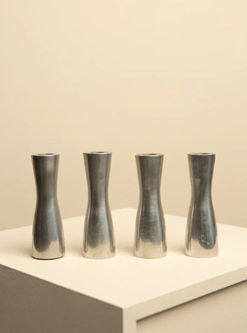 Set of 3 vintage 1990s Erika Pekkari chrome-plated candleholders, stylish and elegant home decor accents