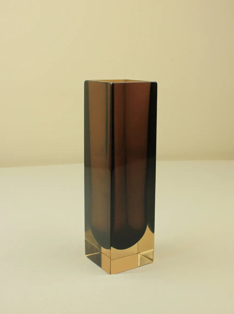 Hand-blown Murano glass vase with intricate swirls and patterns