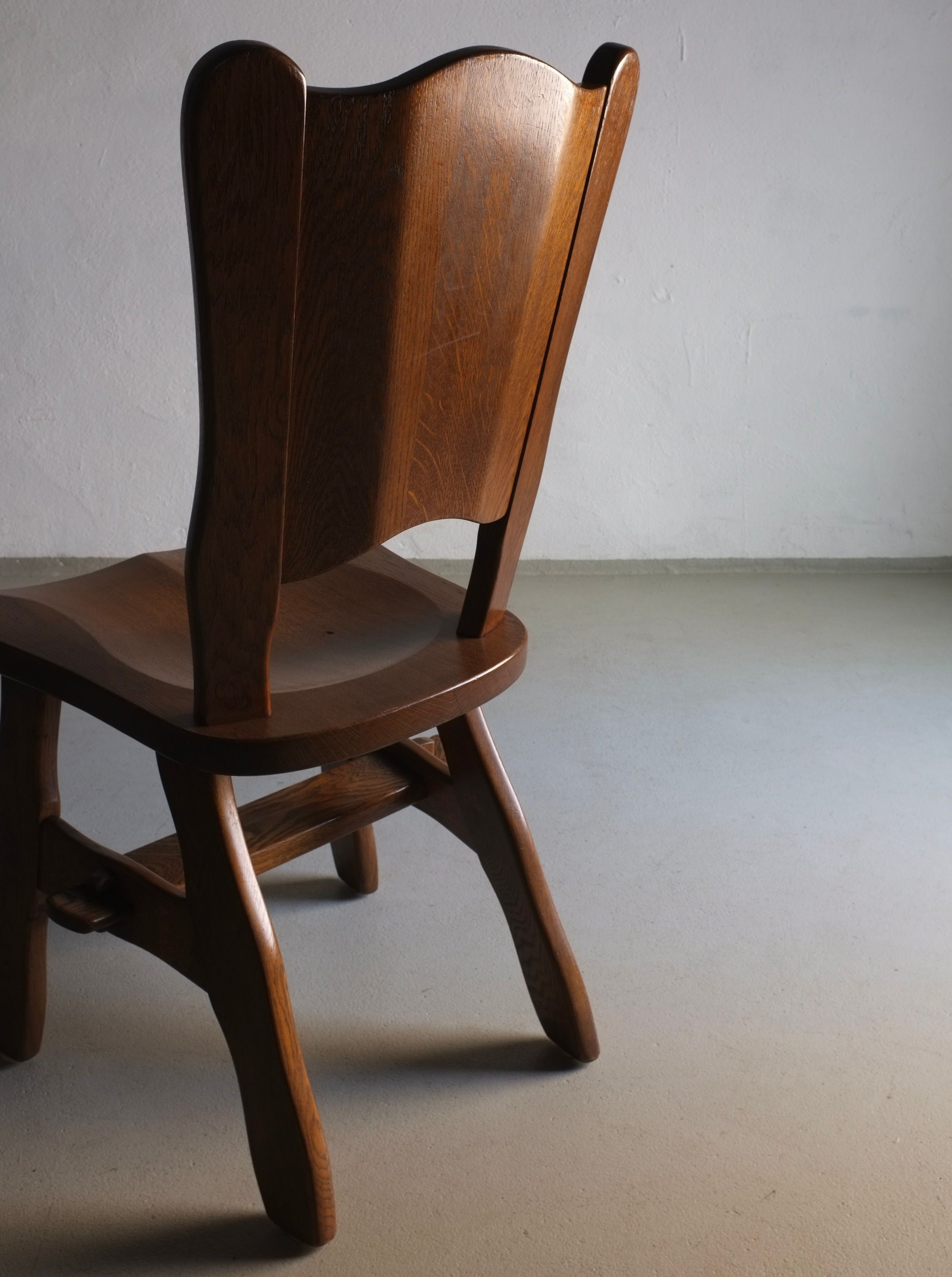 Two vintage Brutalist oak chairs with unique 1970s design