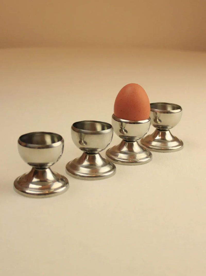 Set of 4 stainless steel egg cups, perfect for serving at breakfast or brunch