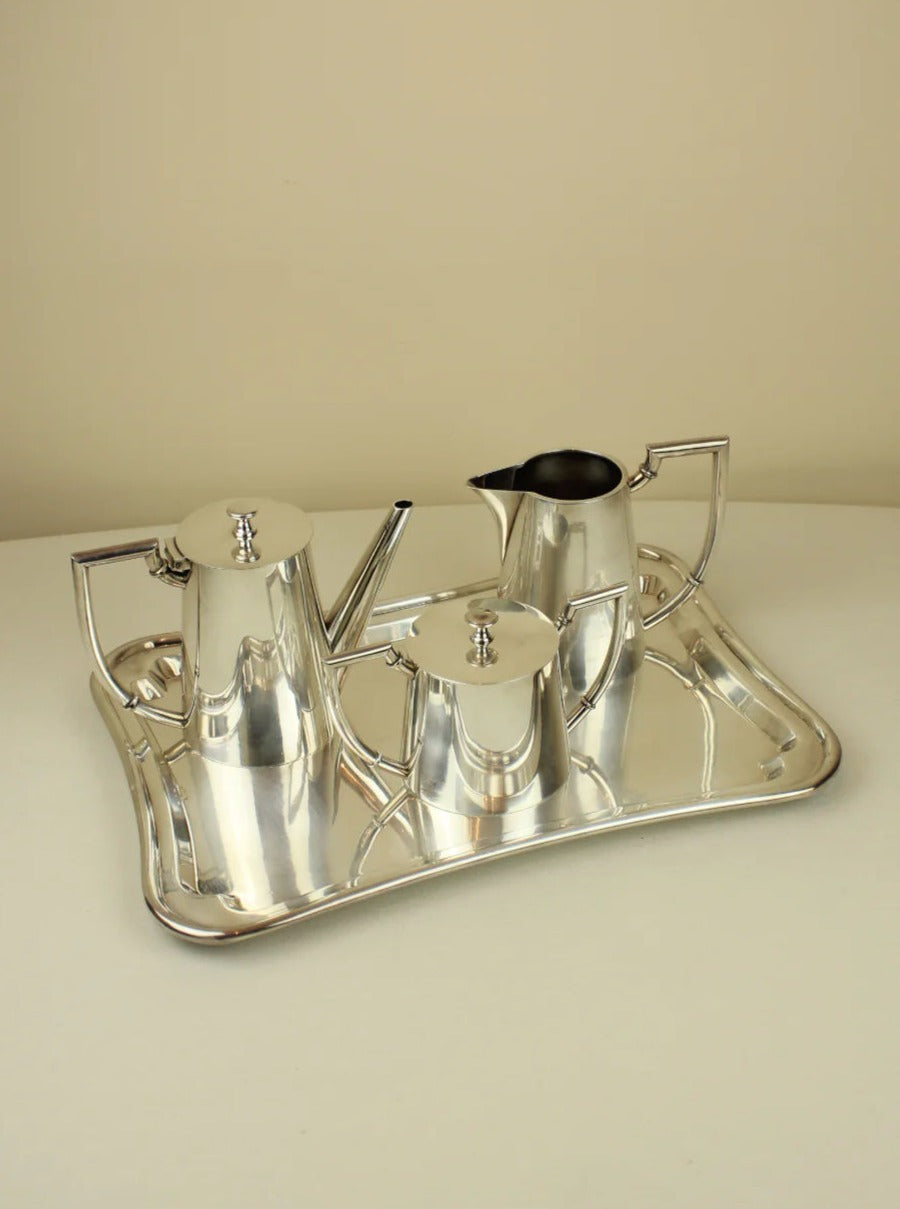 Art Deco Tea/Coffee Service set with matching cups, saucers, and pot