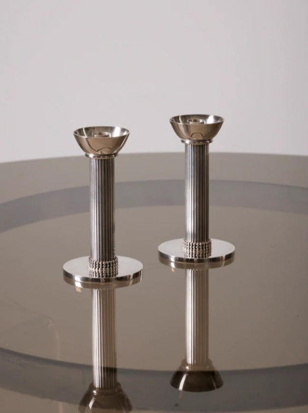 Candleholders by Jean Despres