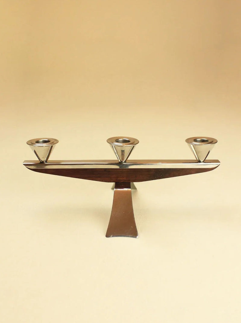 Vintage 1960 Candleholder with a polished gold finish and elegant curves