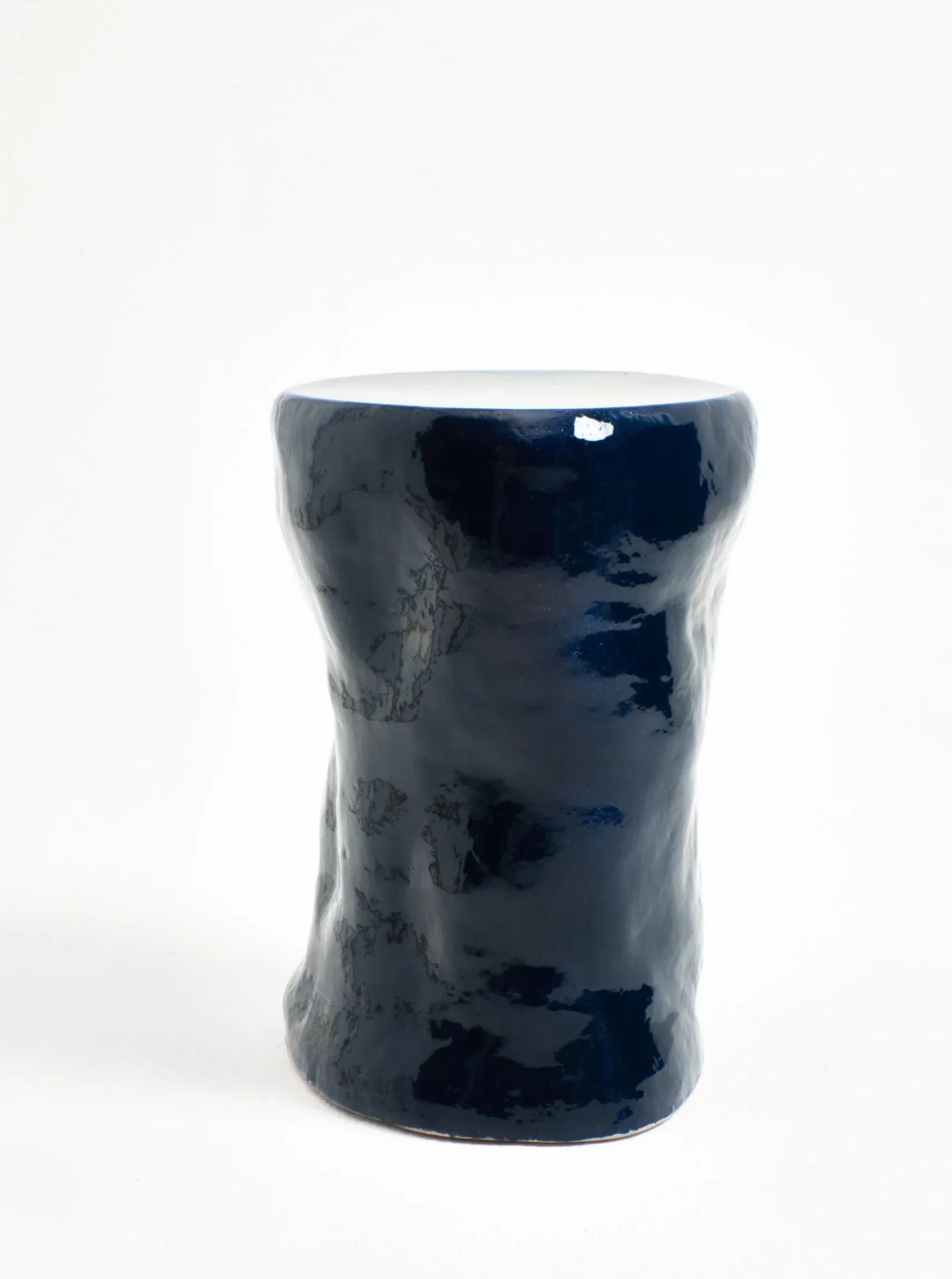  Ceramic drum-shaped side table in a matte black finish with a geometric pattern