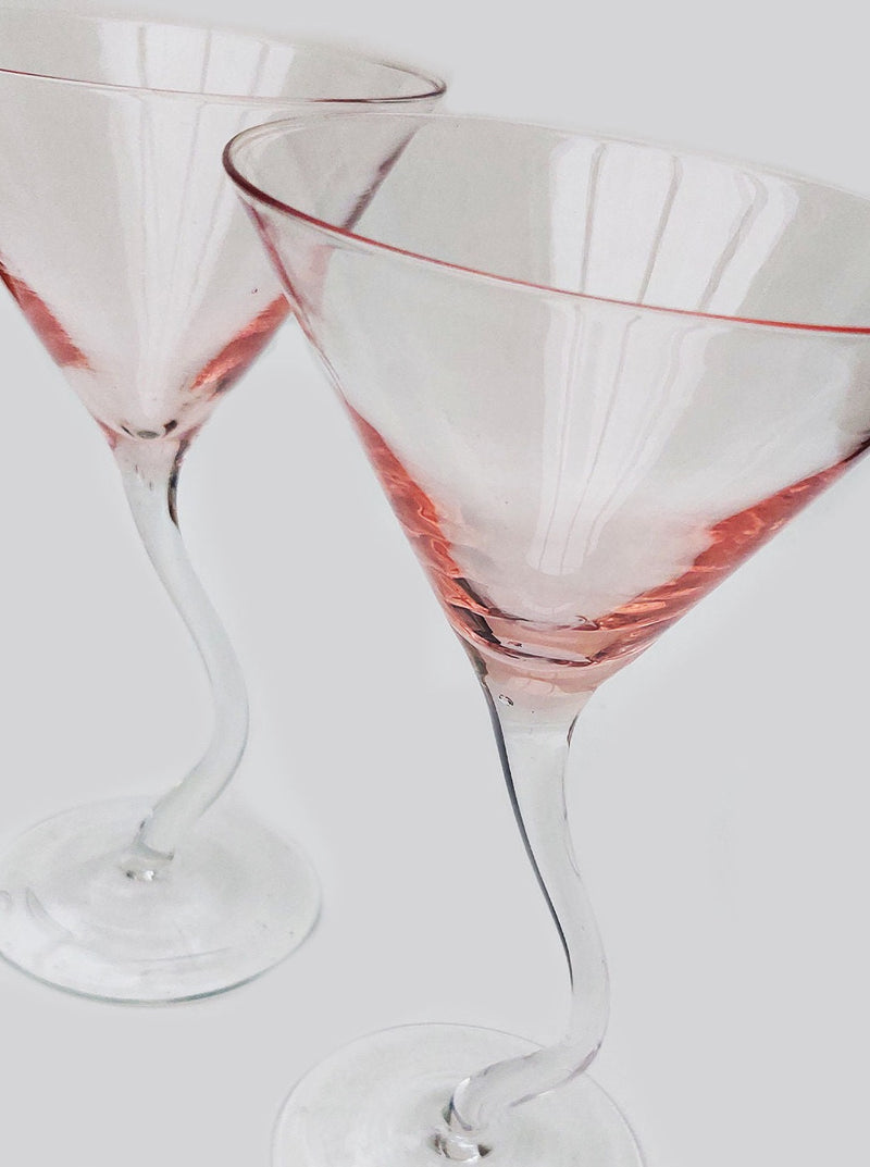 Two elegant wavy cocktail glasses, perfect for serving your favorite drinks