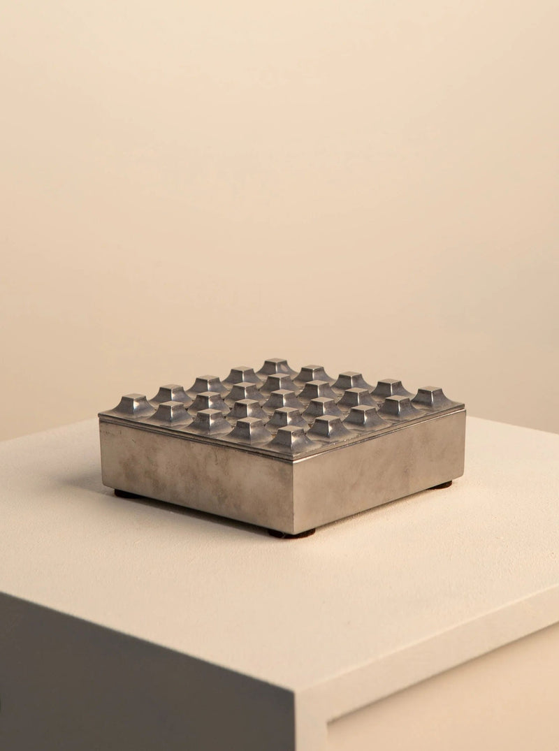 Vintage Metal Ashtray Ultima 15 designed by Holger Bäckström & Bo Ljungberg in the 1970's for Pascha Ab Lund - image of round metal ashtray with intricate geometric patterns and sleek design
