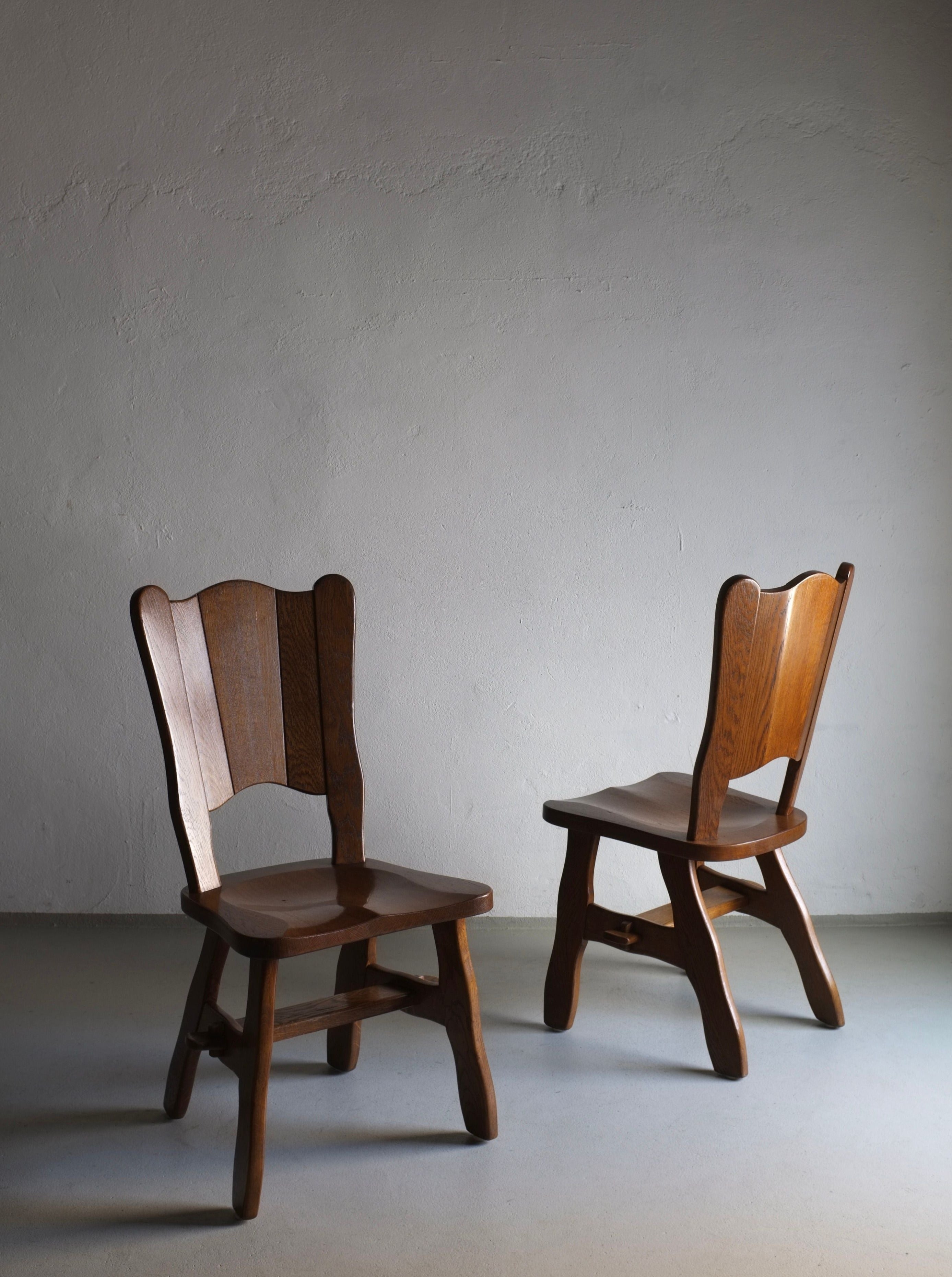 Pair of vintage Brutalist solid oak chairs from the 1970s